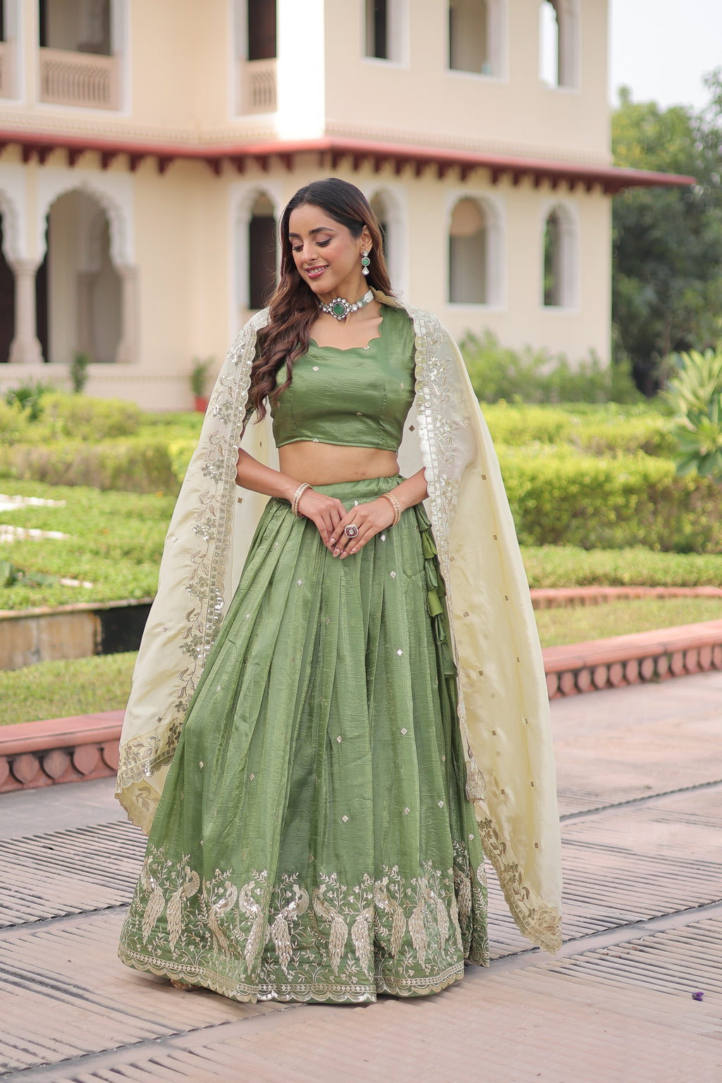Nirika green gold crush lehenga choli with sequins zari embroidered work