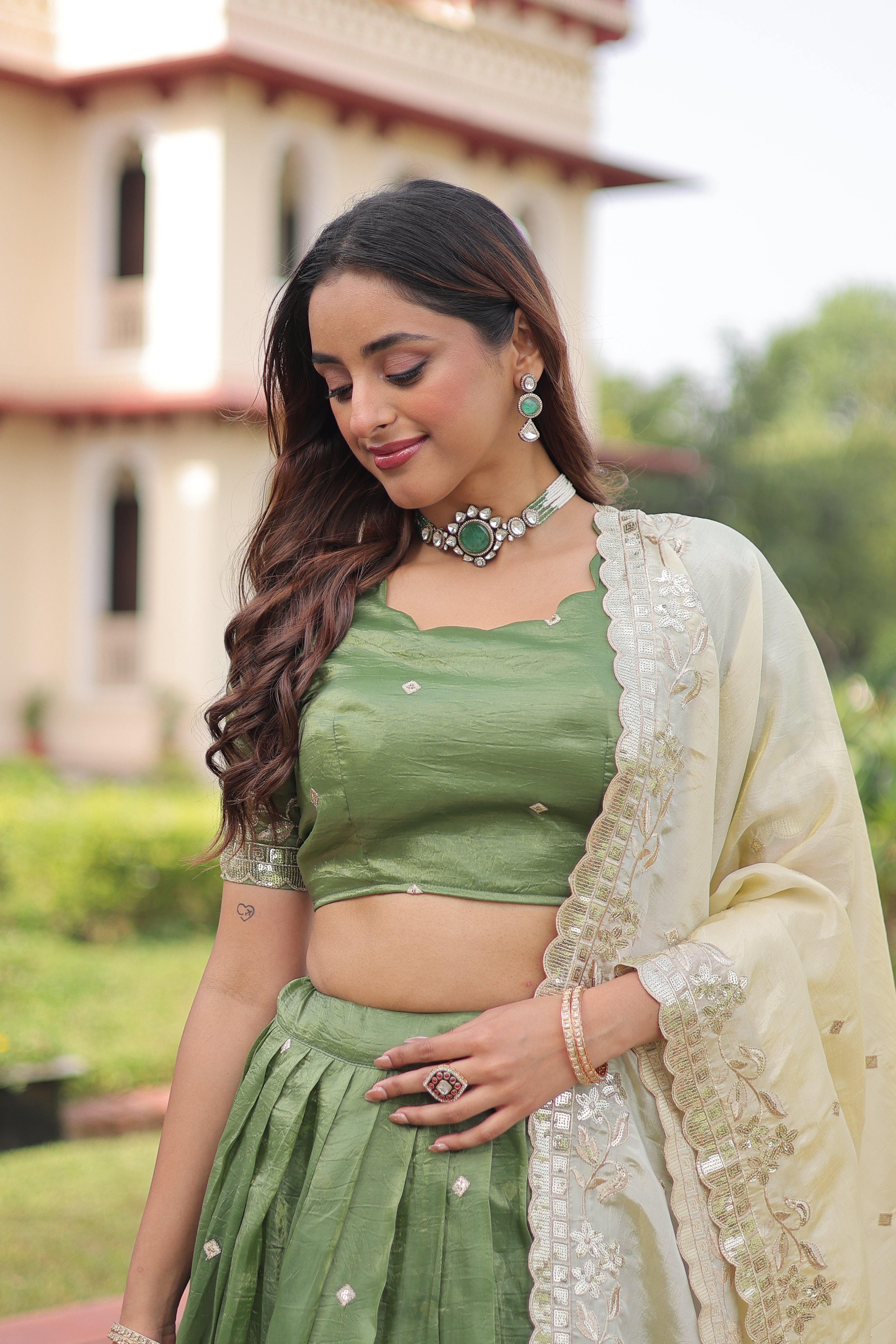 Nirika green gold crush lehenga choli with sequins zari embroidered work