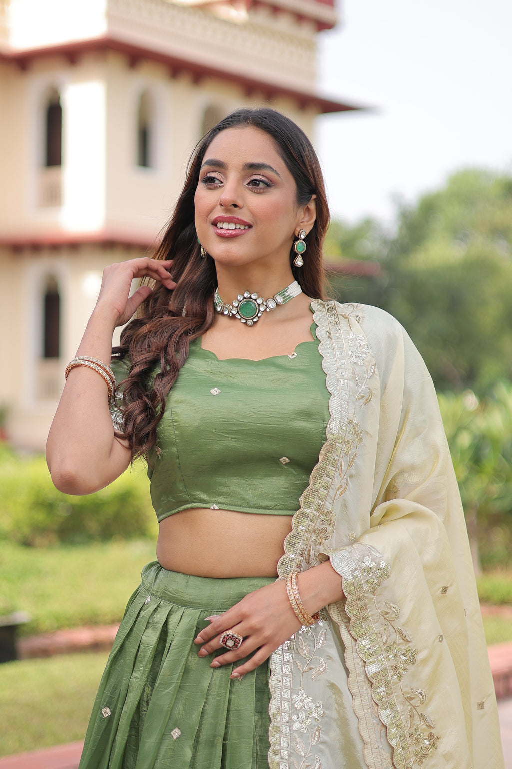 Nirika green gold crush lehenga choli with sequins zari embroidered work