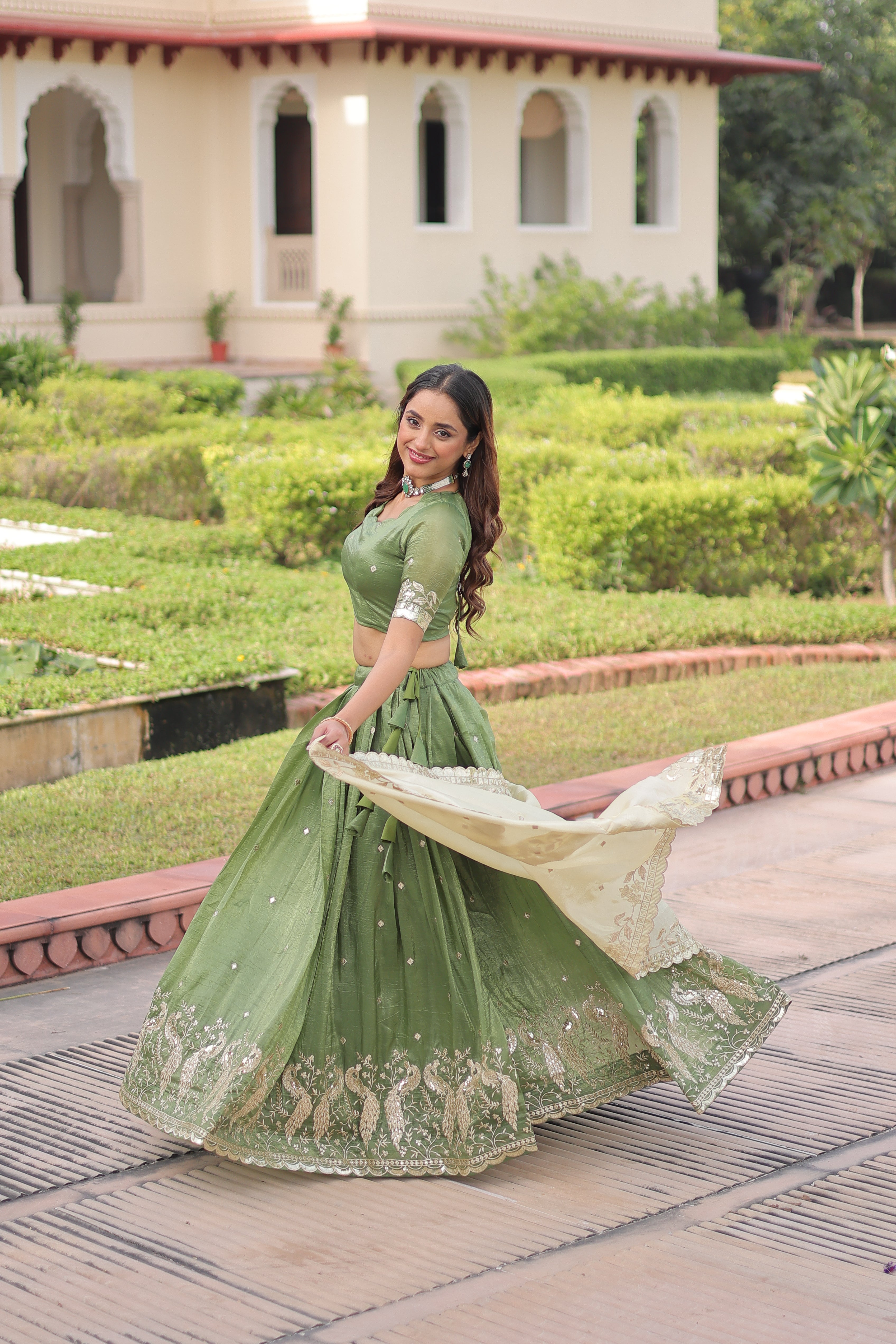 Nirika green gold crush lehenga choli with sequins zari embroidered work