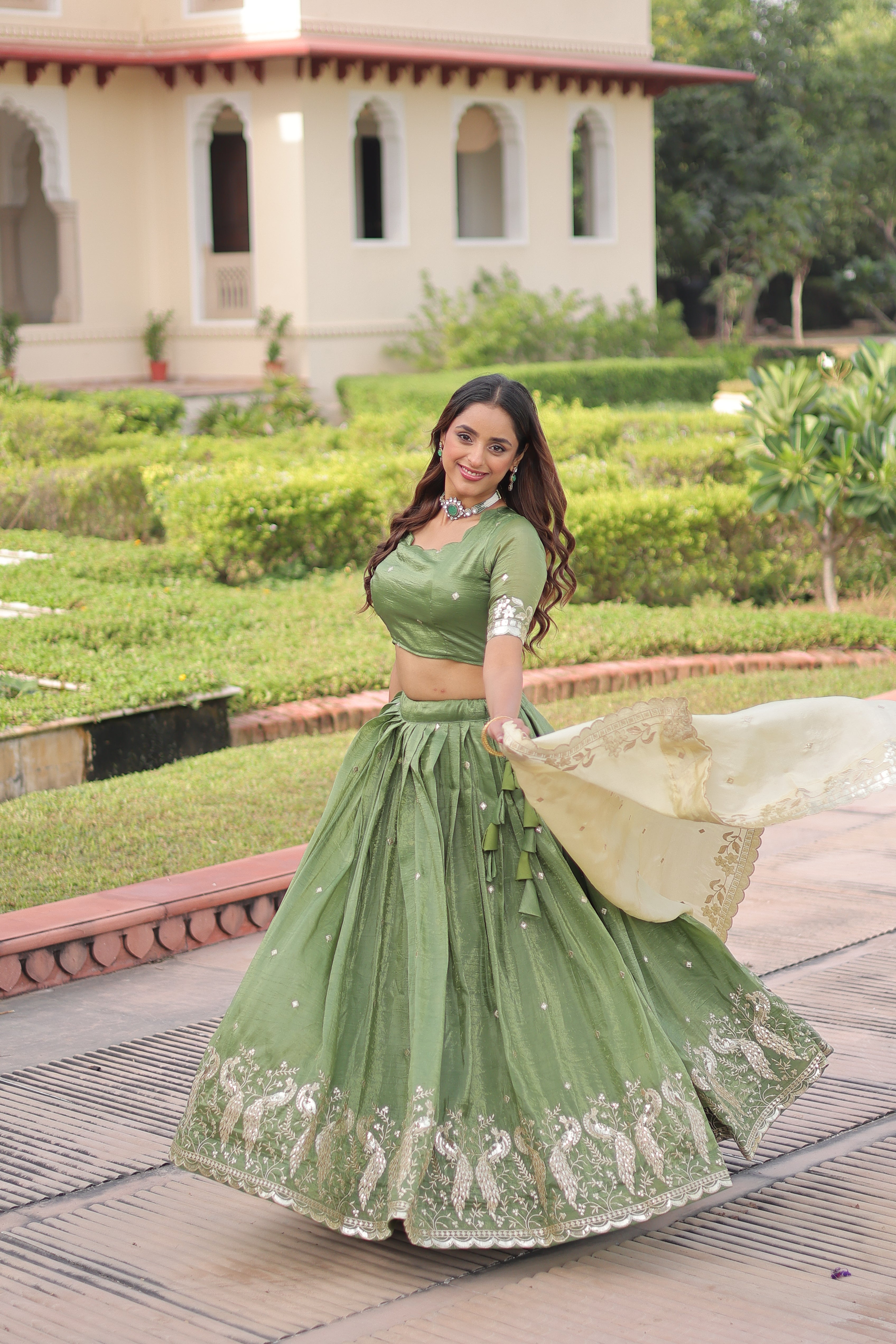 Nirika green gold crush lehenga choli with sequins zari embroidered work
