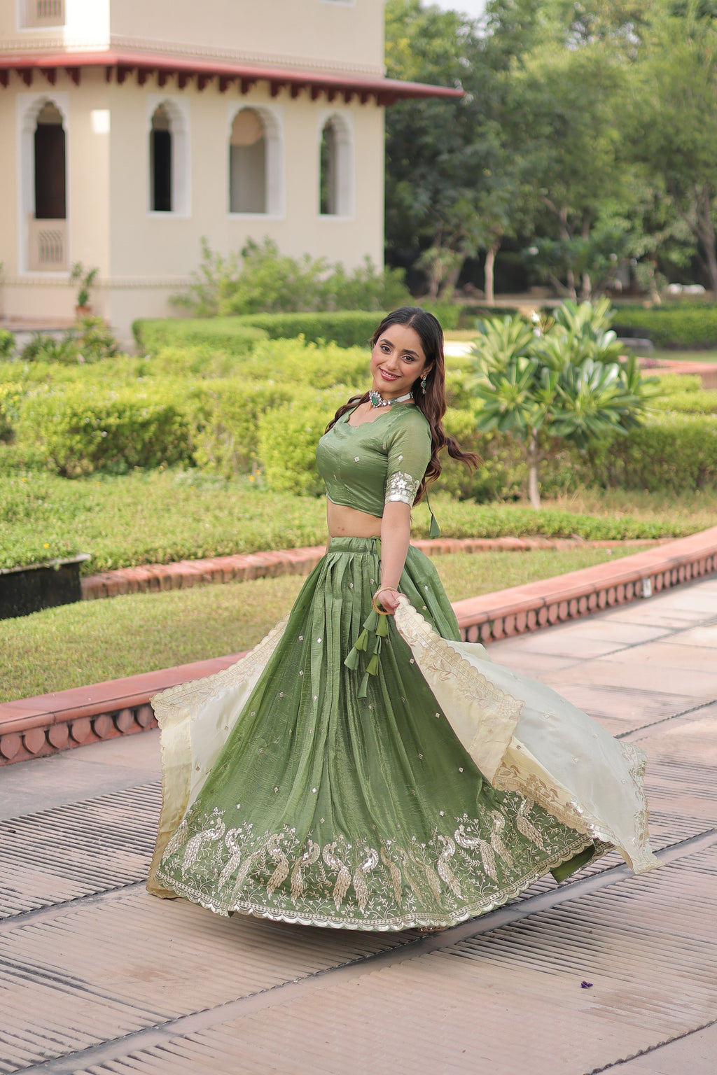 Nirika green gold crush lehenga choli with sequins zari embroidered work