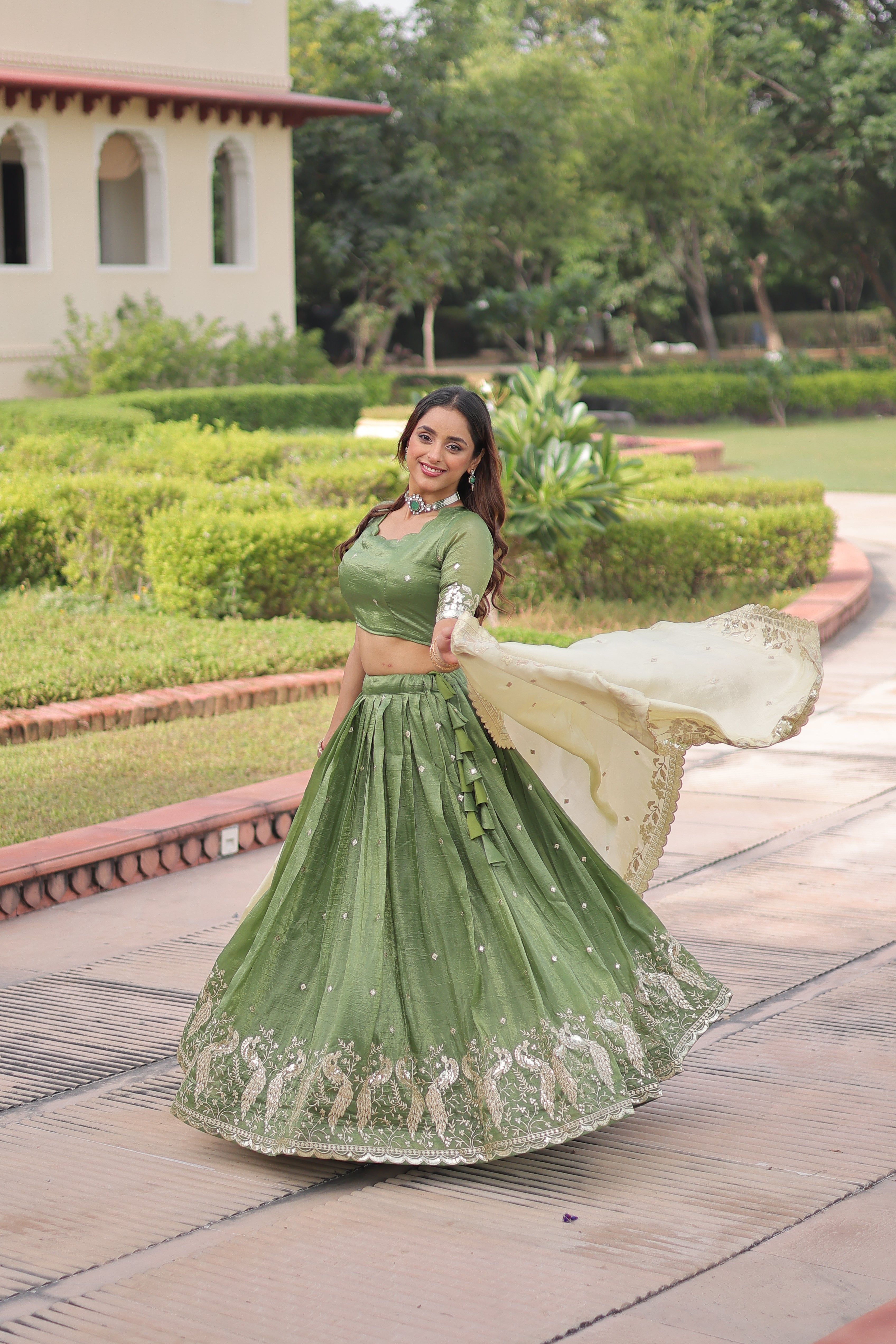Nirika green gold crush lehenga choli with sequins zari embroidered work
