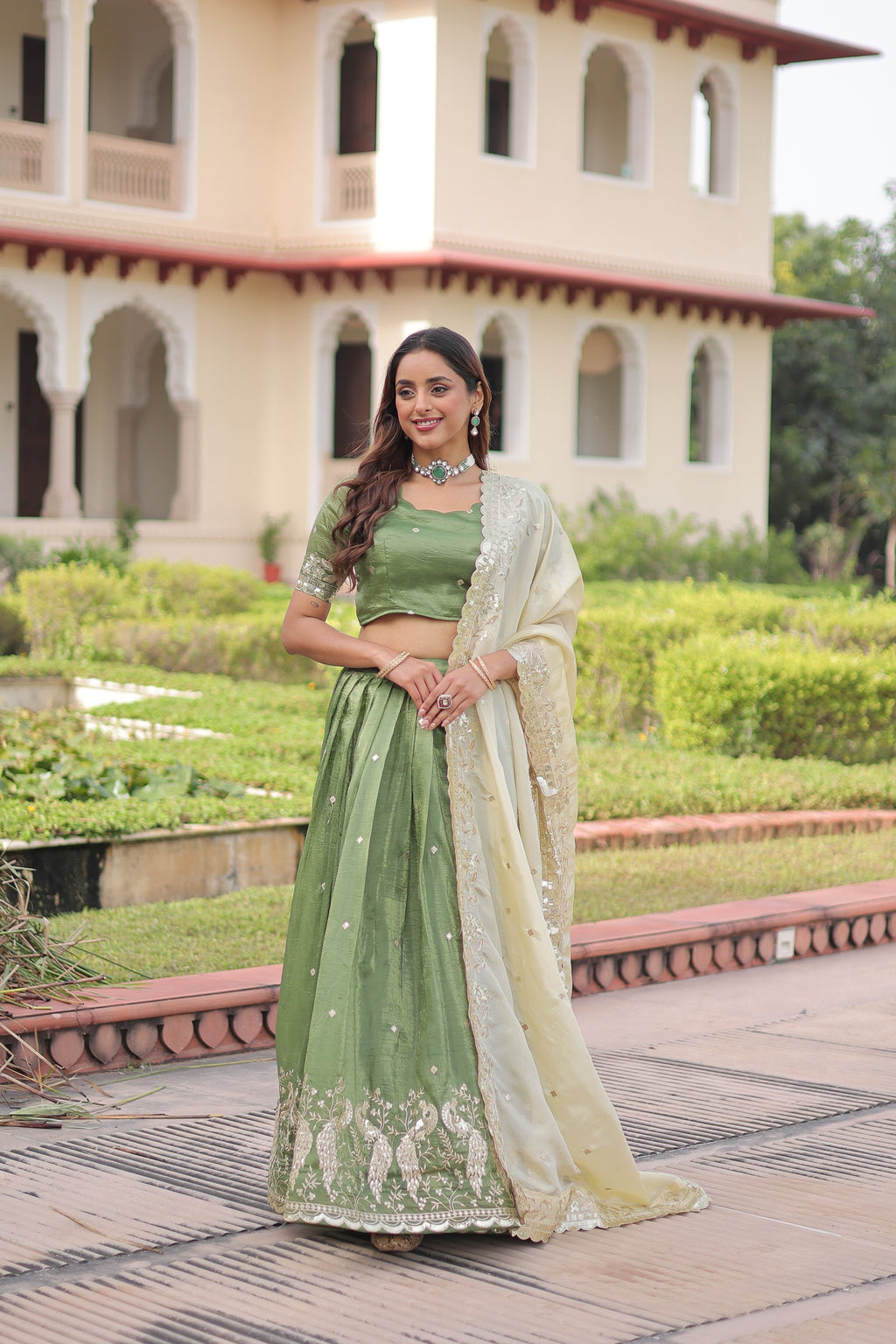 Nirika green gold crush lehenga choli with sequins zari embroidered work