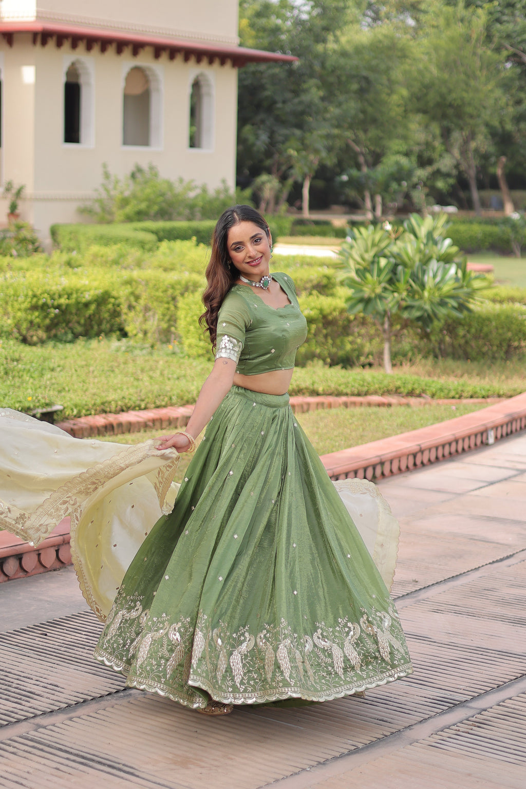 Nirika green gold crush lehenga choli with sequins zari embroidered work
