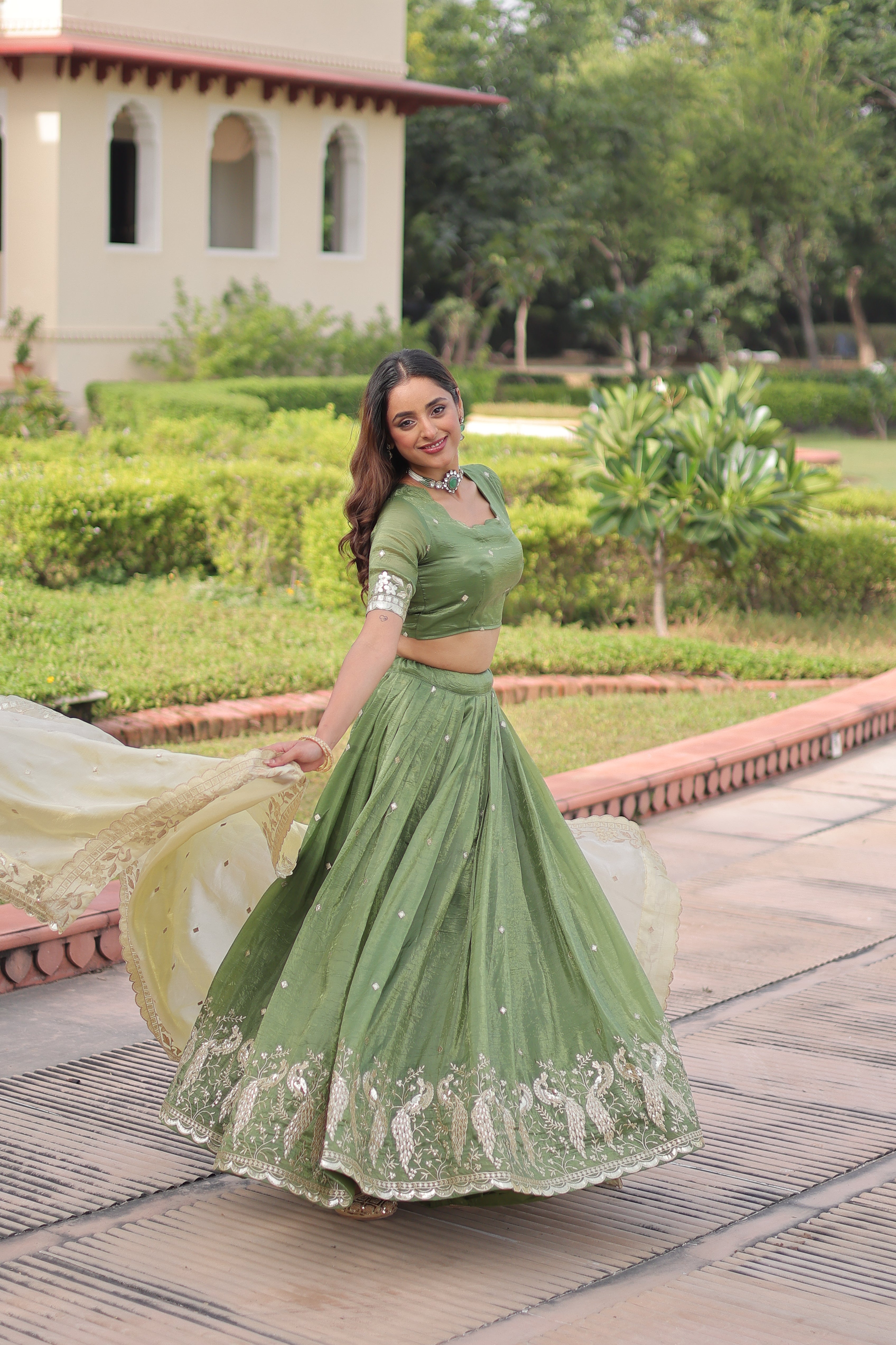 Nirika green gold crush lehenga choli with sequins zari embroidered work