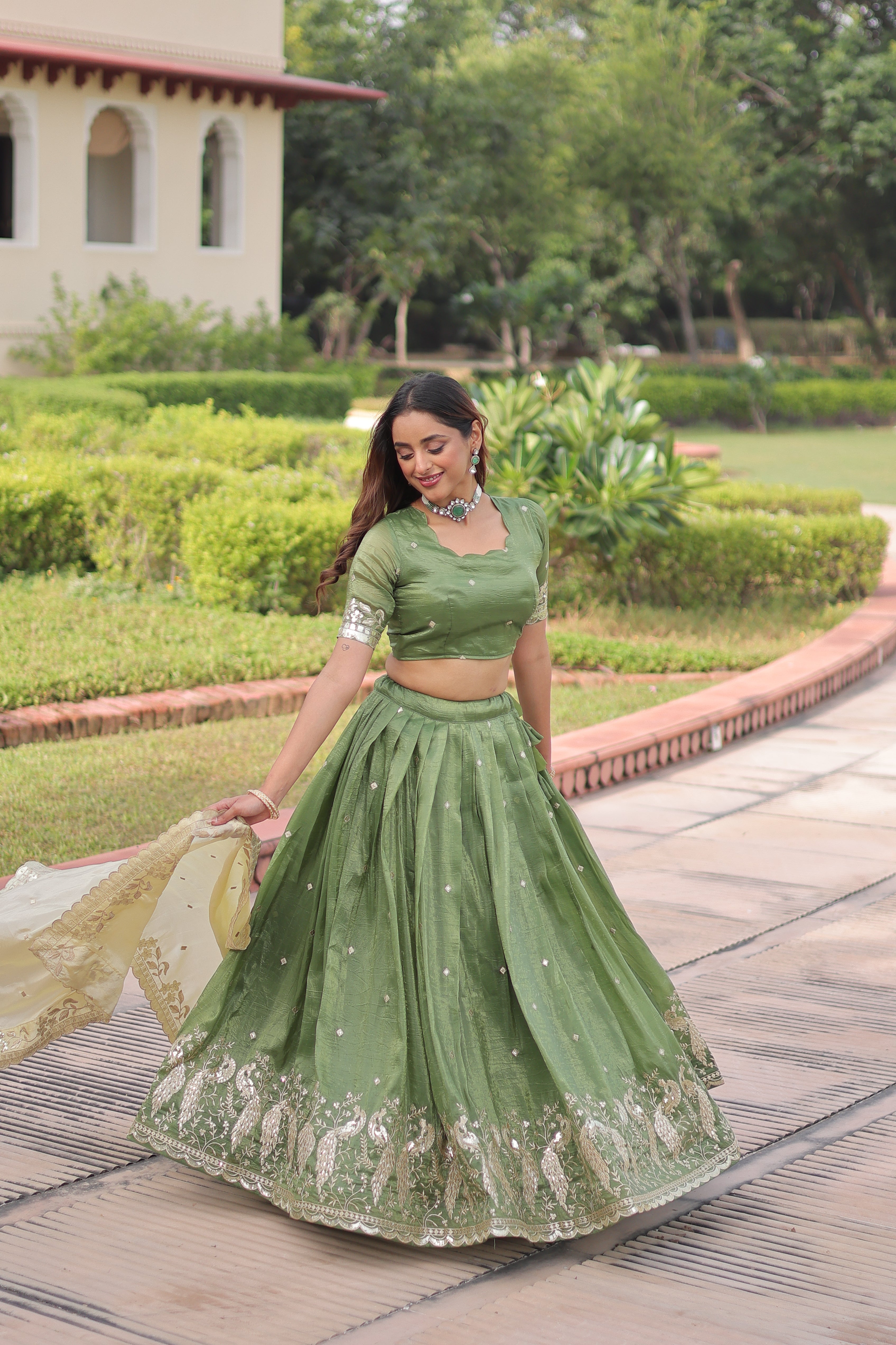 Nirika green gold crush lehenga choli with sequins zari embroidered work
