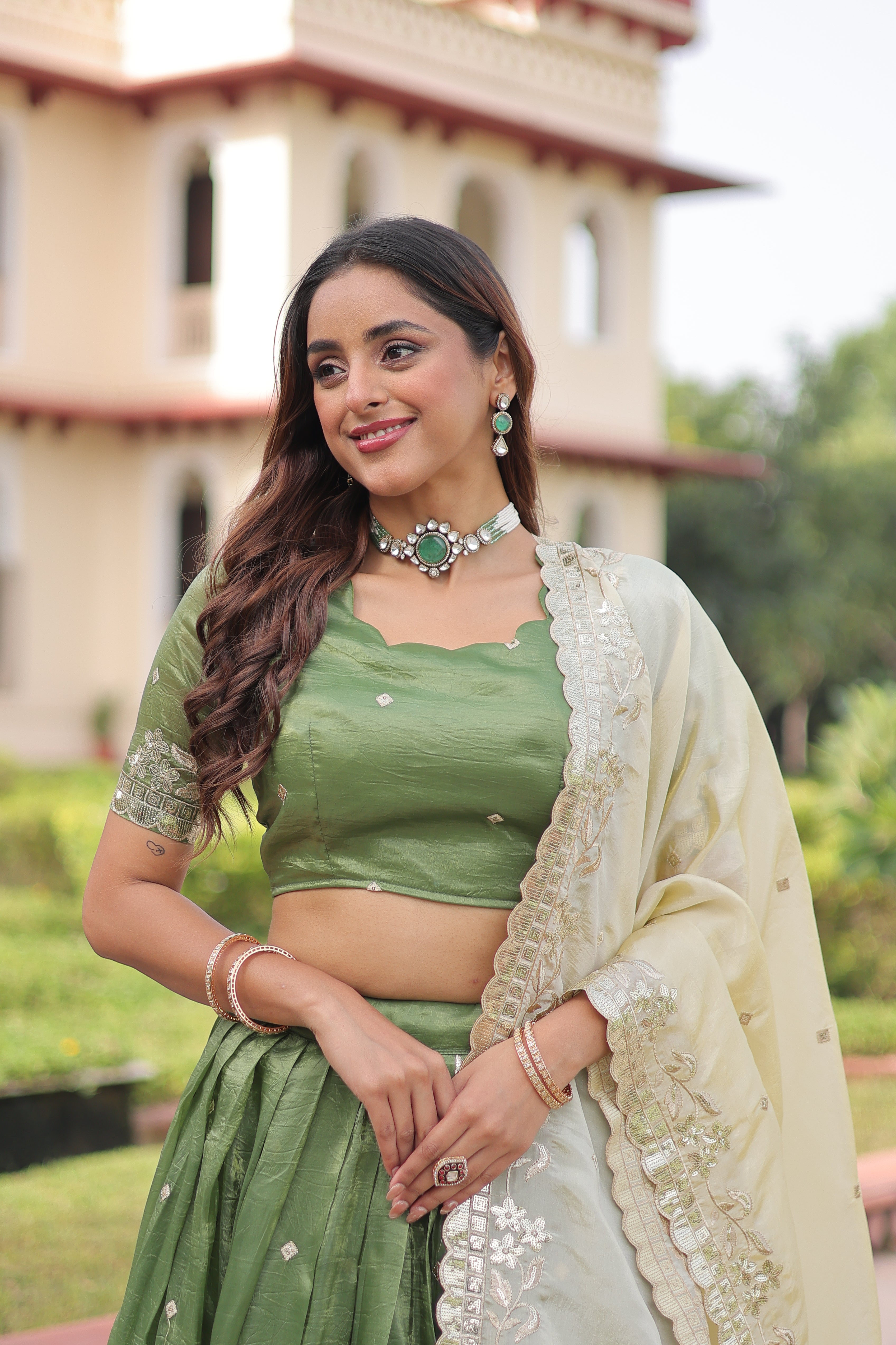 Nirika green gold crush lehenga choli with sequins zari embroidered work