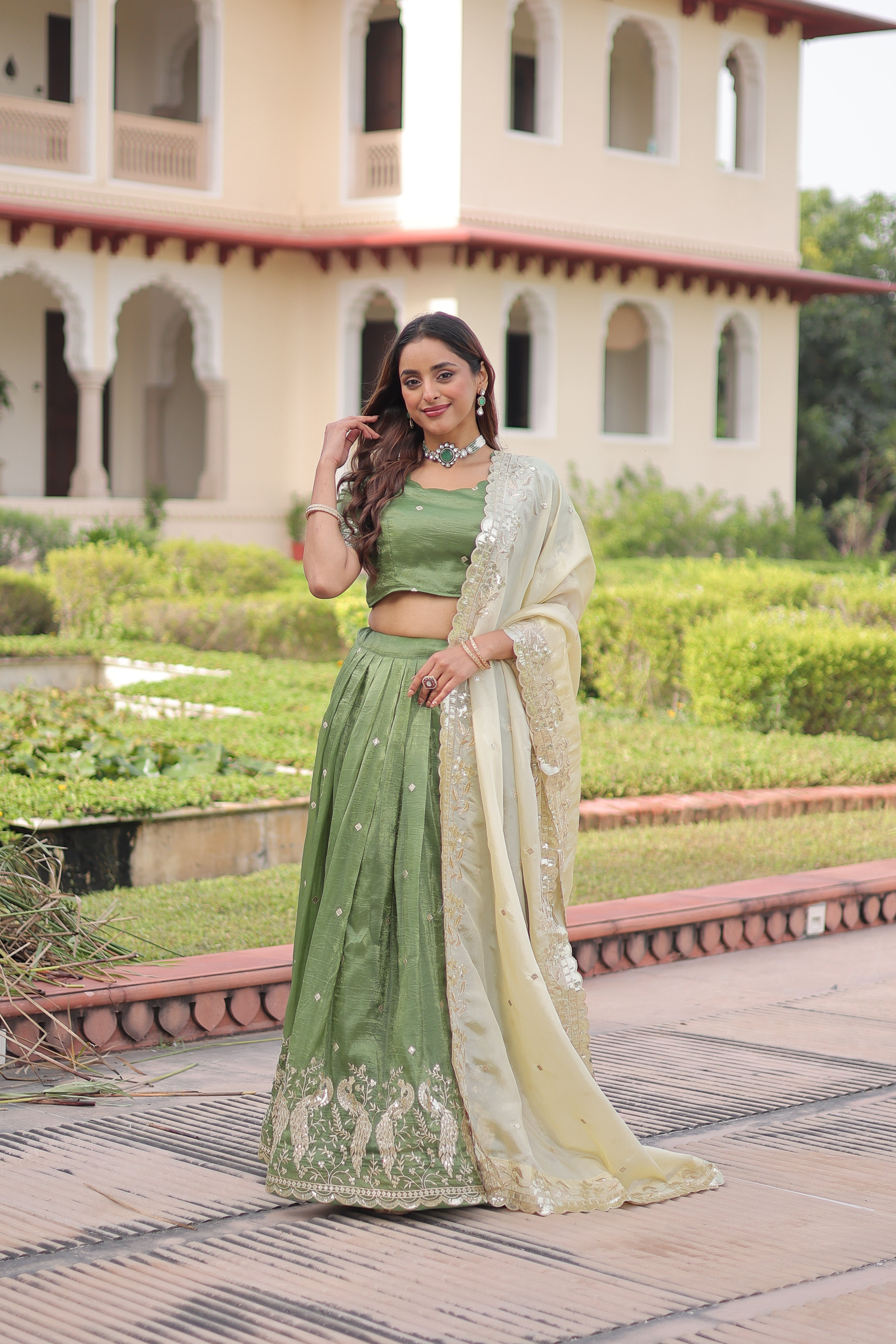 Nirika green gold crush lehenga choli with sequins zari embroidered work