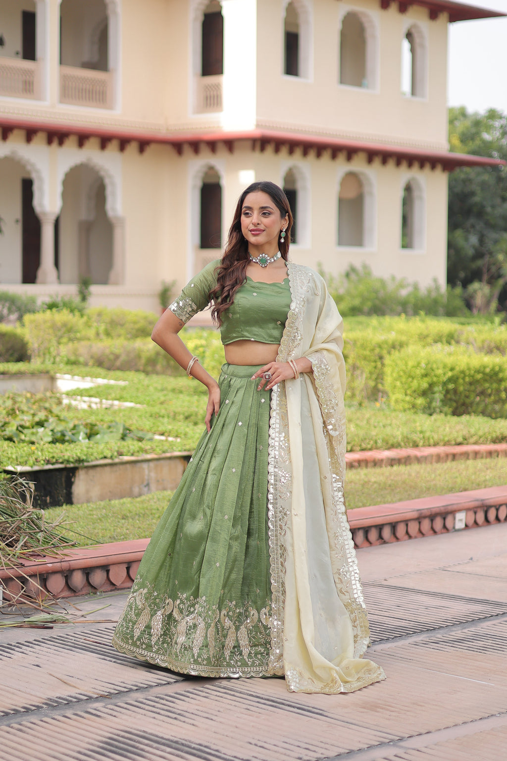 Nirika green gold crush lehenga choli with sequins zari embroidered work