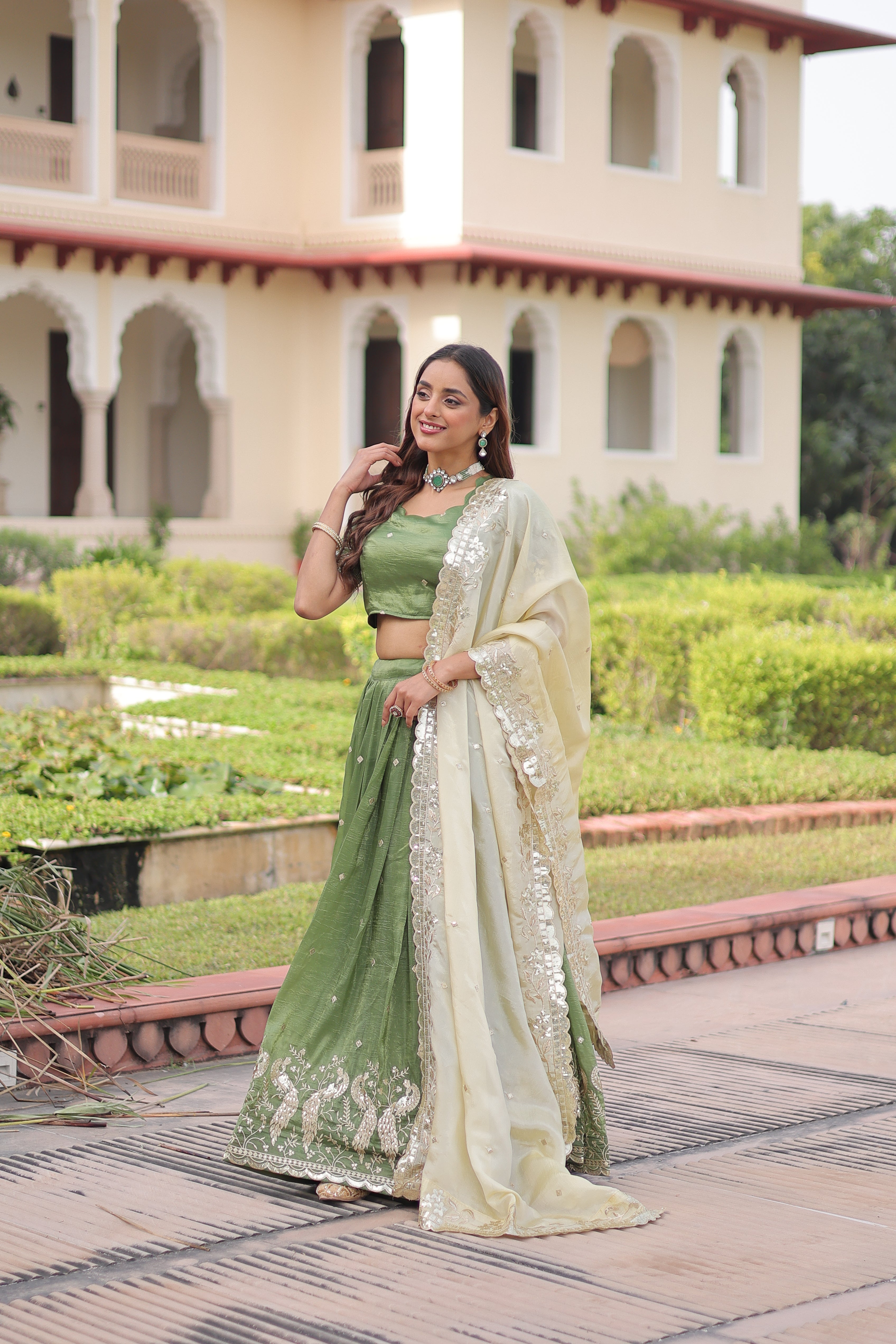 Nirika green gold crush lehenga choli with sequins zari embroidered work