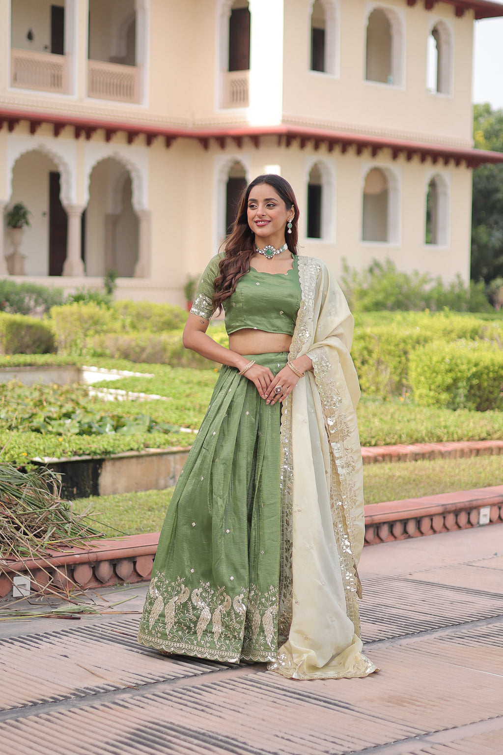 Nirika green gold crush lehenga choli with sequins zari embroidered work