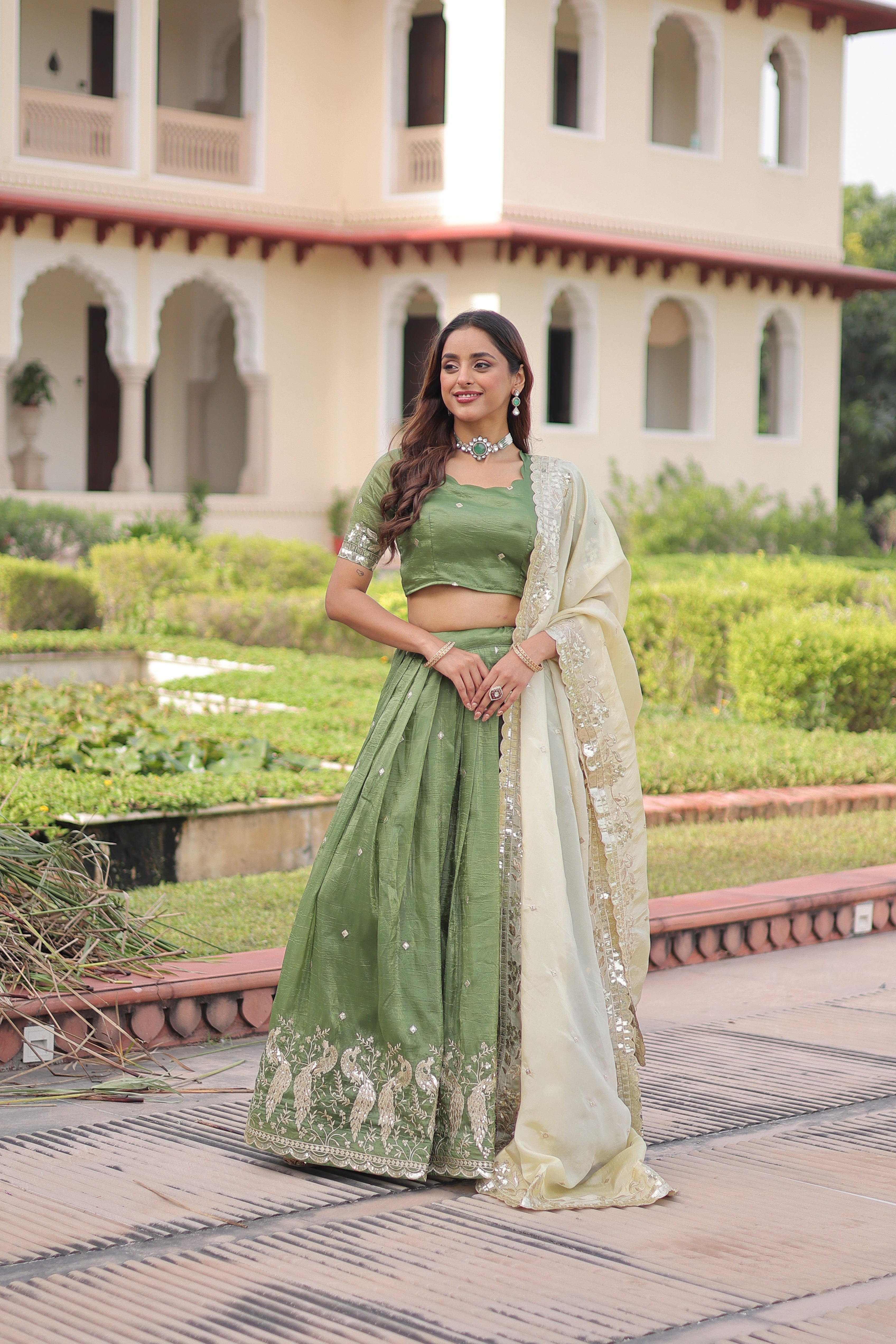 Nirika green gold crush lehenga choli with sequins zari embroidered work