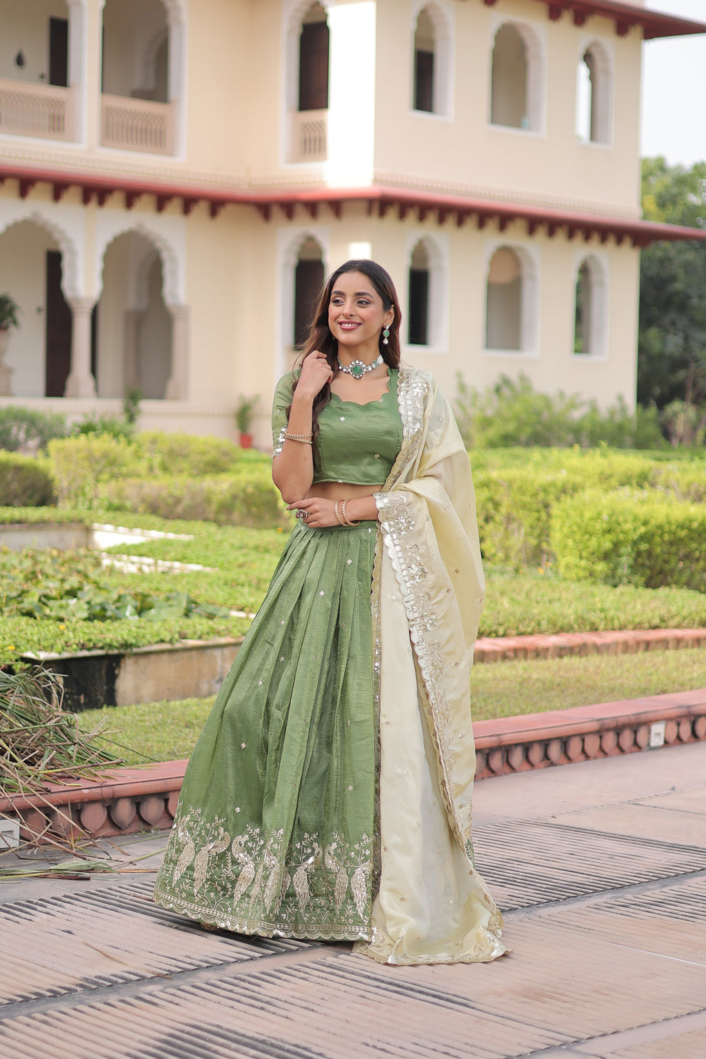 Nirika green gold crush lehenga choli with sequins zari embroidered work