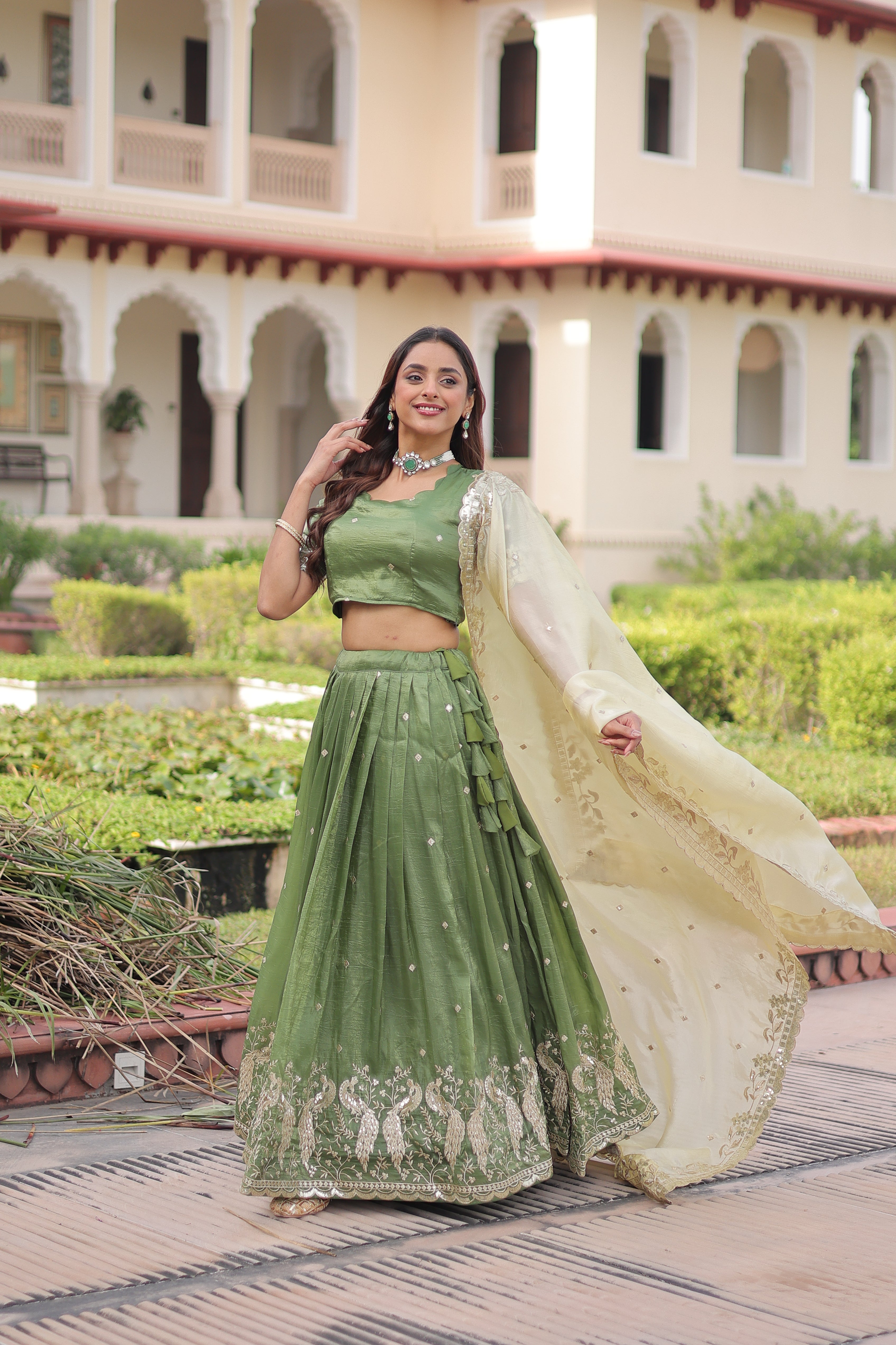 Nirika green gold crush lehenga choli with sequins zari embroidered work