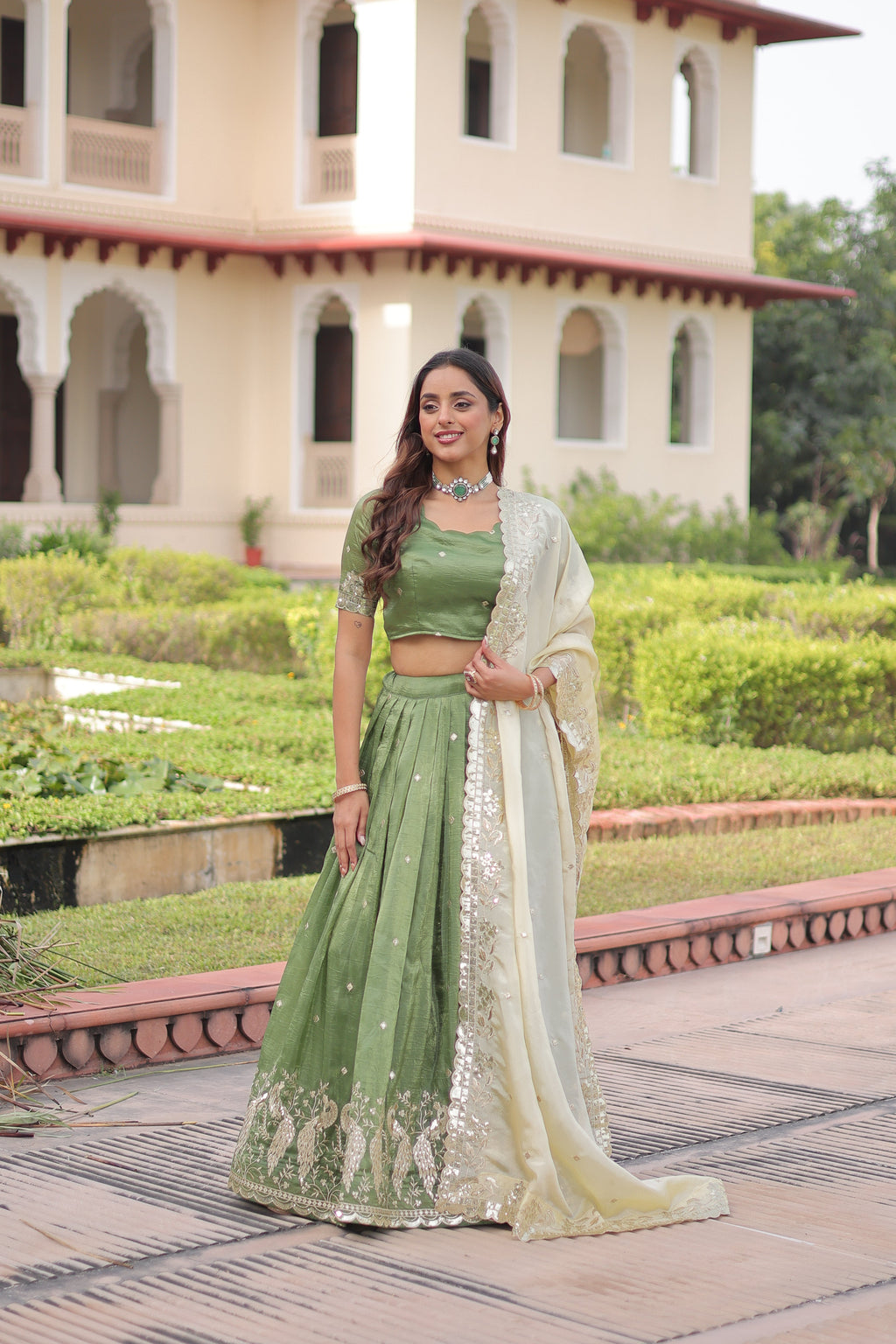 Nirika green gold crush lehenga choli with sequins zari embroidered work