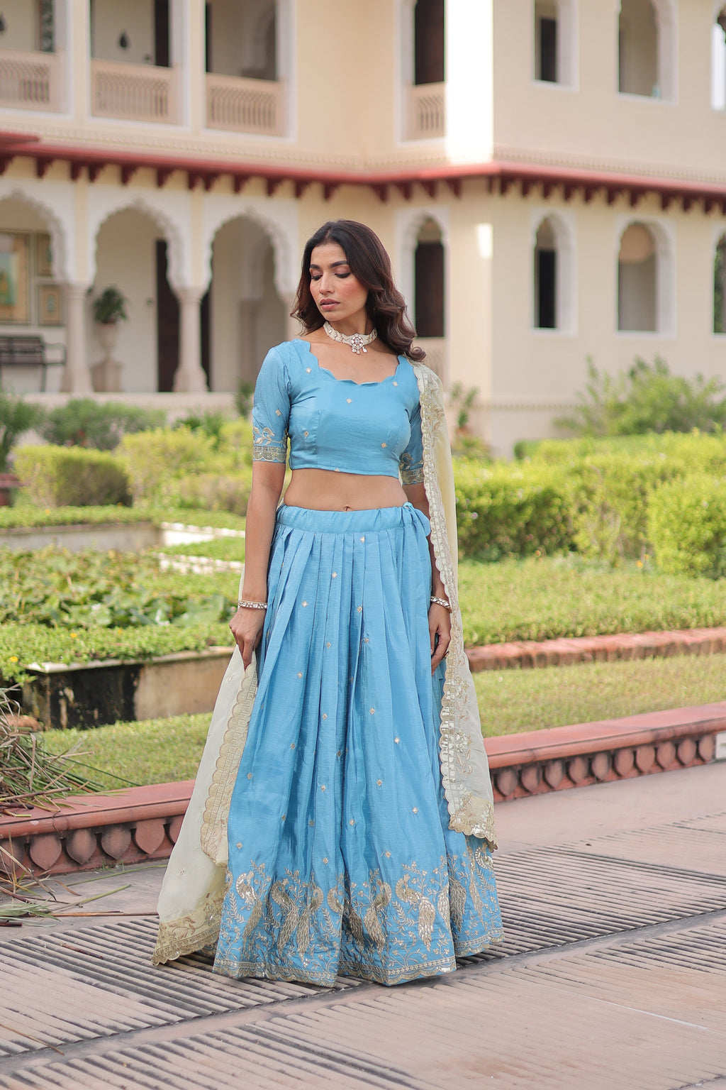 Nirika sky blue gold crush lehenga choli with sequins zari embroidered work