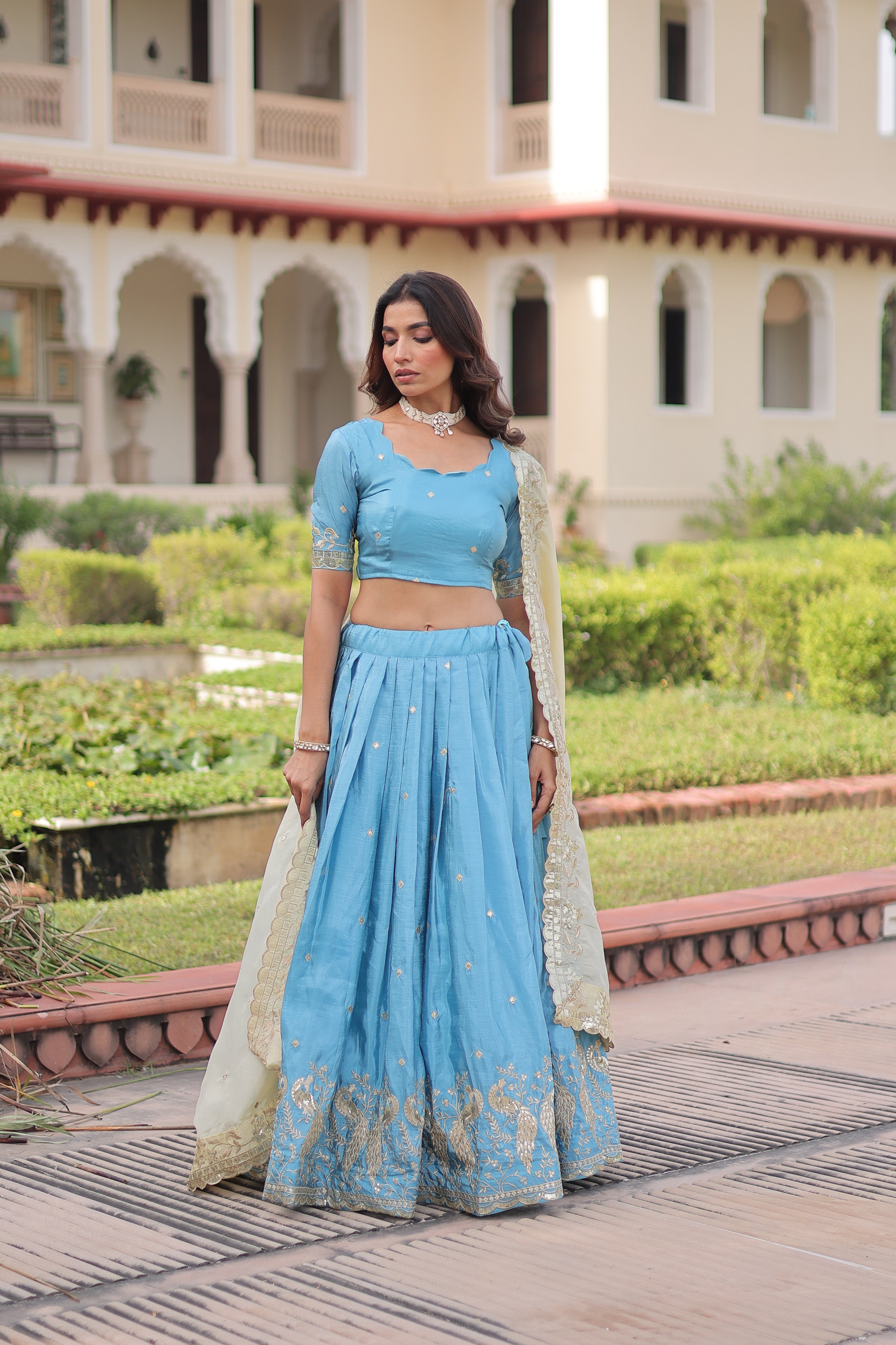 Nirika sky blue gold crush lehenga choli with sequins zari embroidered work