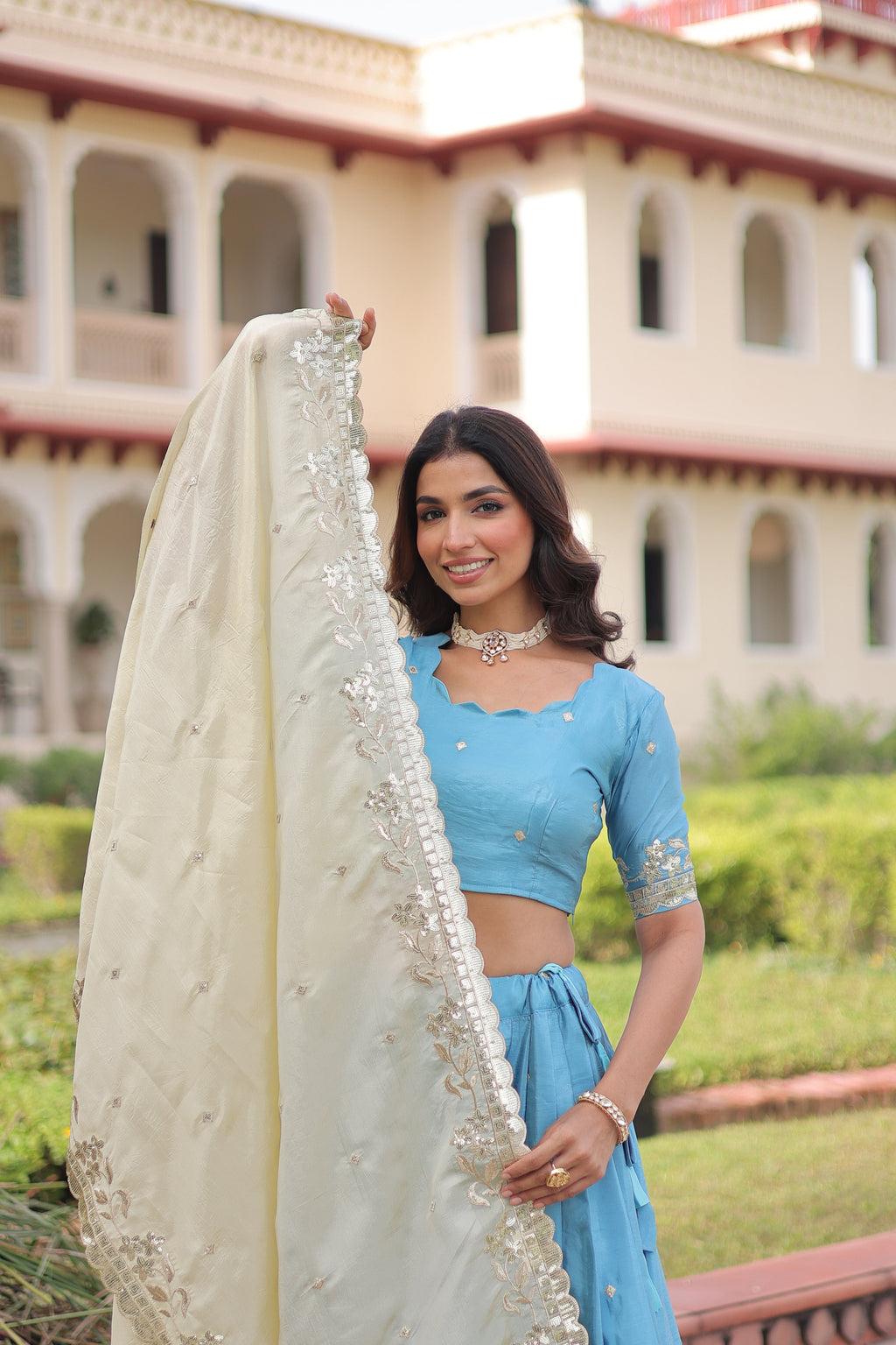 Nirika sky blue gold crush lehenga choli with sequins zari embroidered work