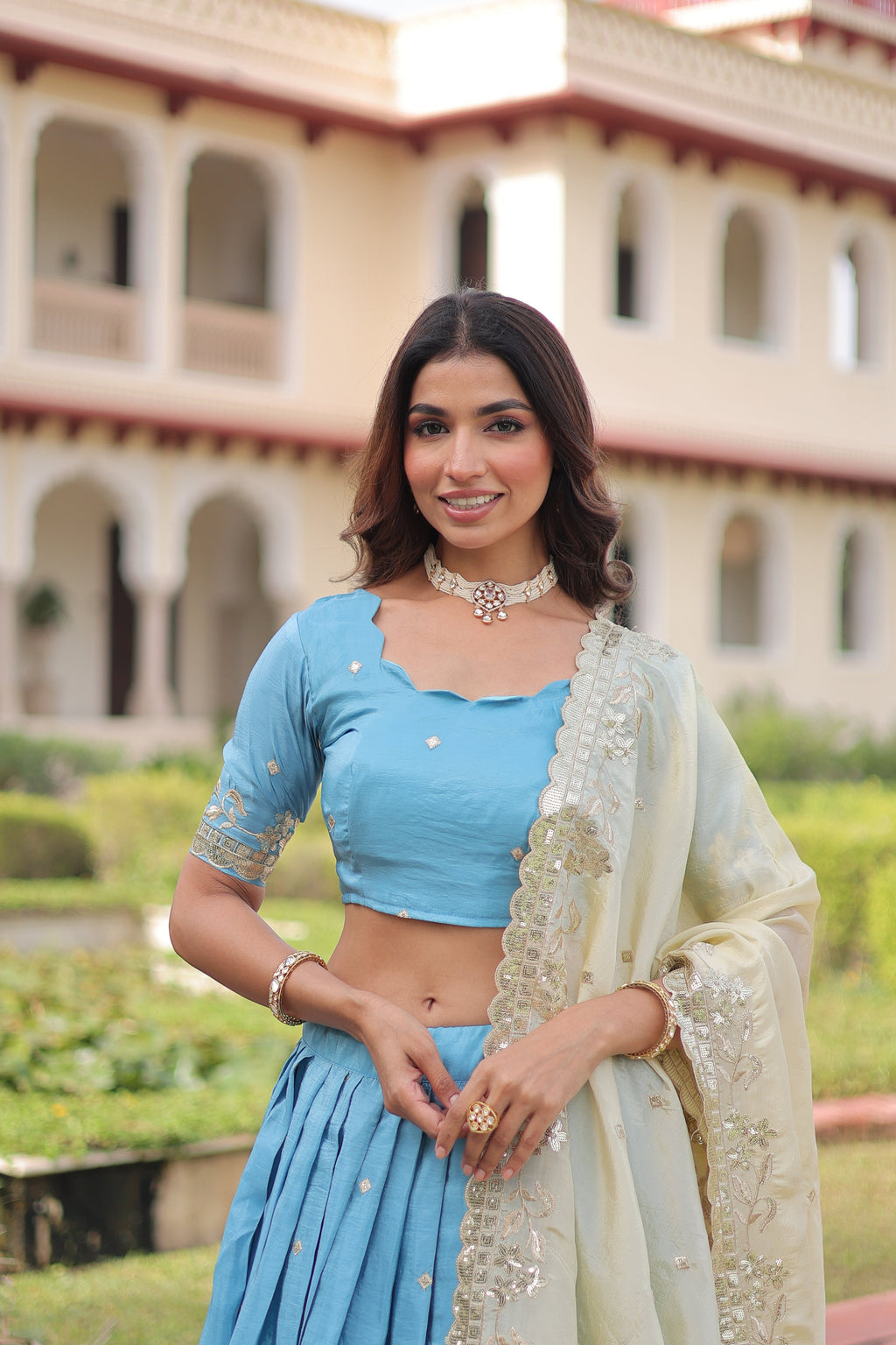 Nirika sky blue gold crush lehenga choli with sequins zari embroidered work