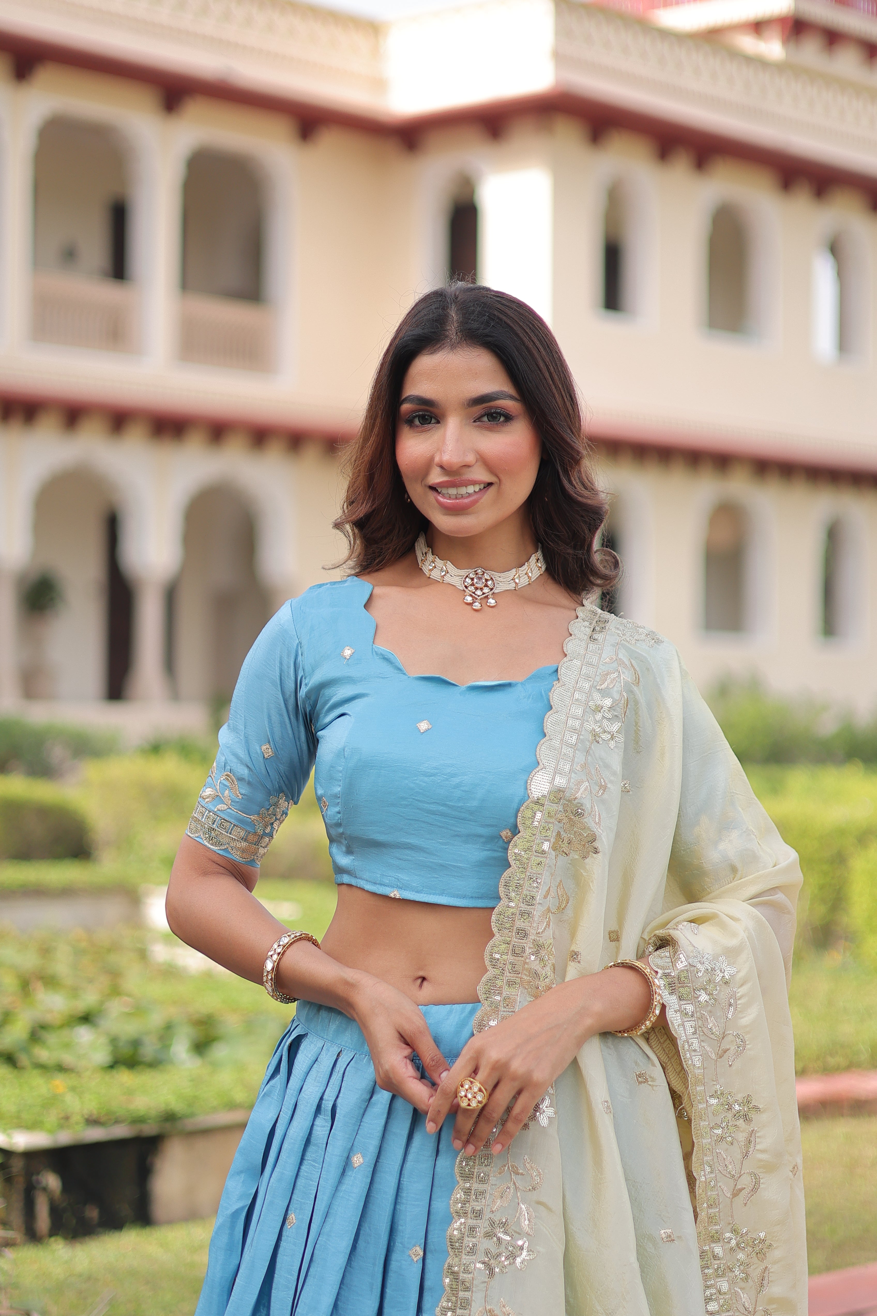 Nirika sky blue gold crush lehenga choli with sequins zari embroidered work