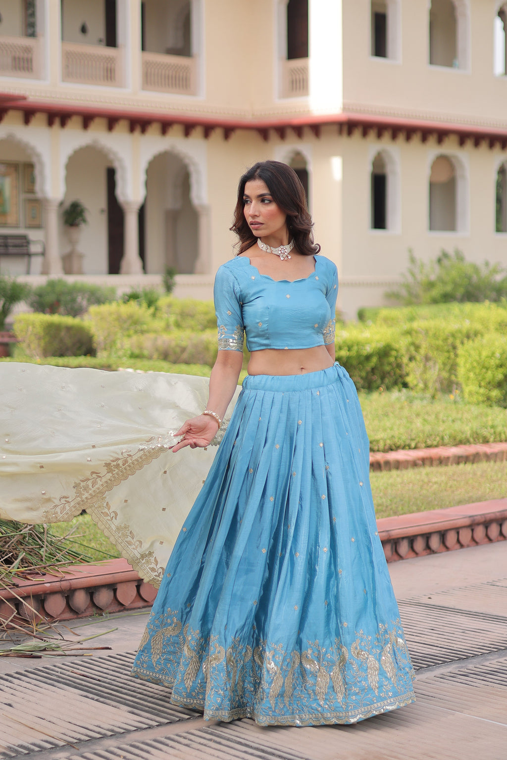 Nirika sky blue gold crush lehenga choli with sequins zari embroidered work