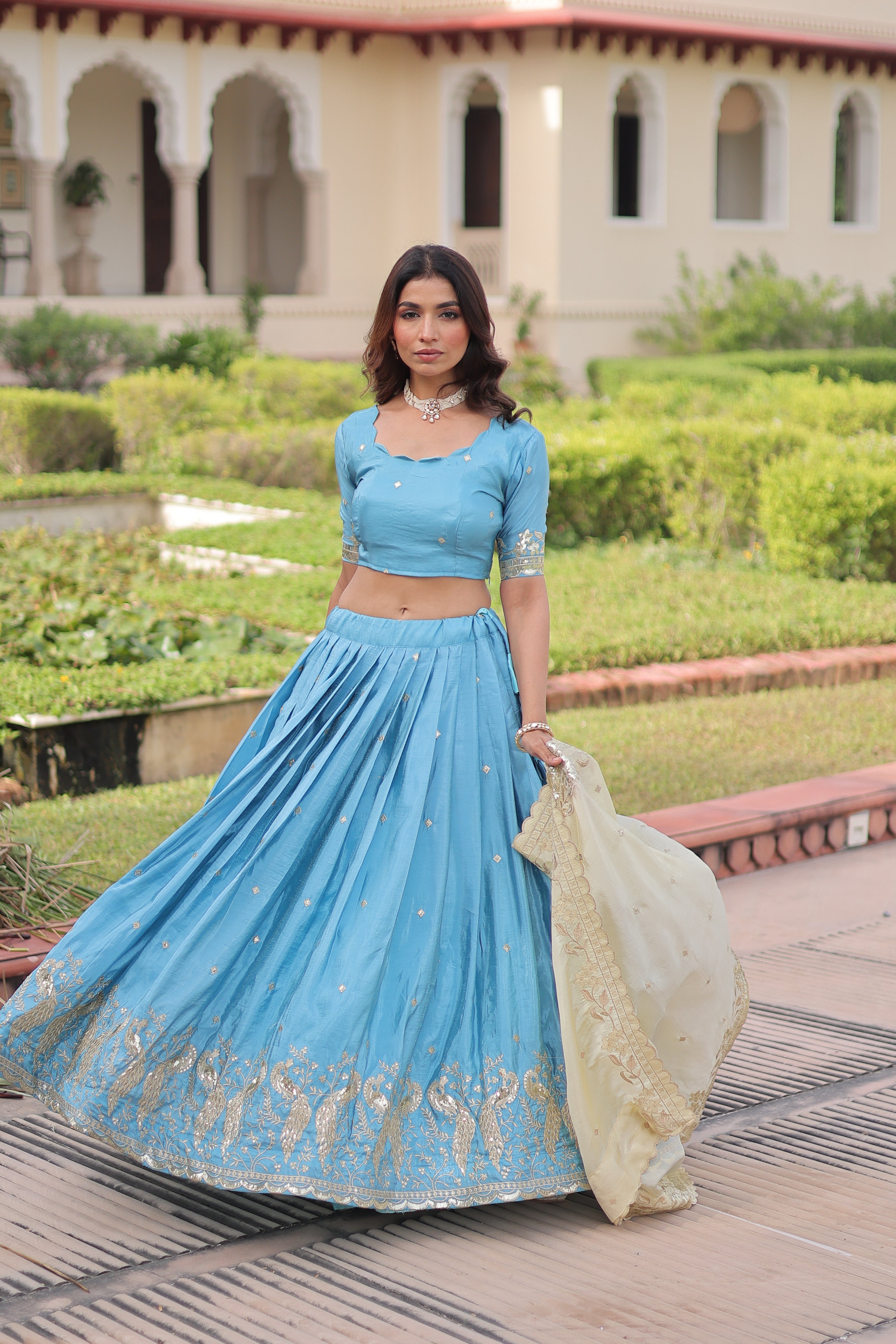 Nirika sky blue gold crush lehenga choli with sequins zari embroidered work