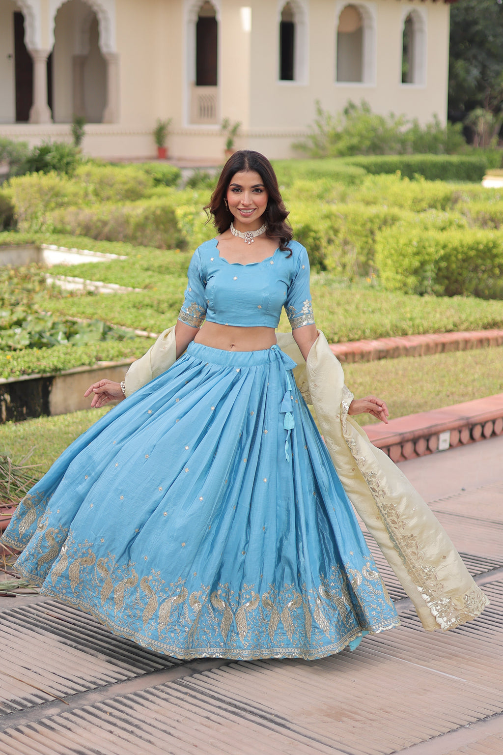 Nirika sky blue gold crush lehenga choli with sequins zari embroidered work