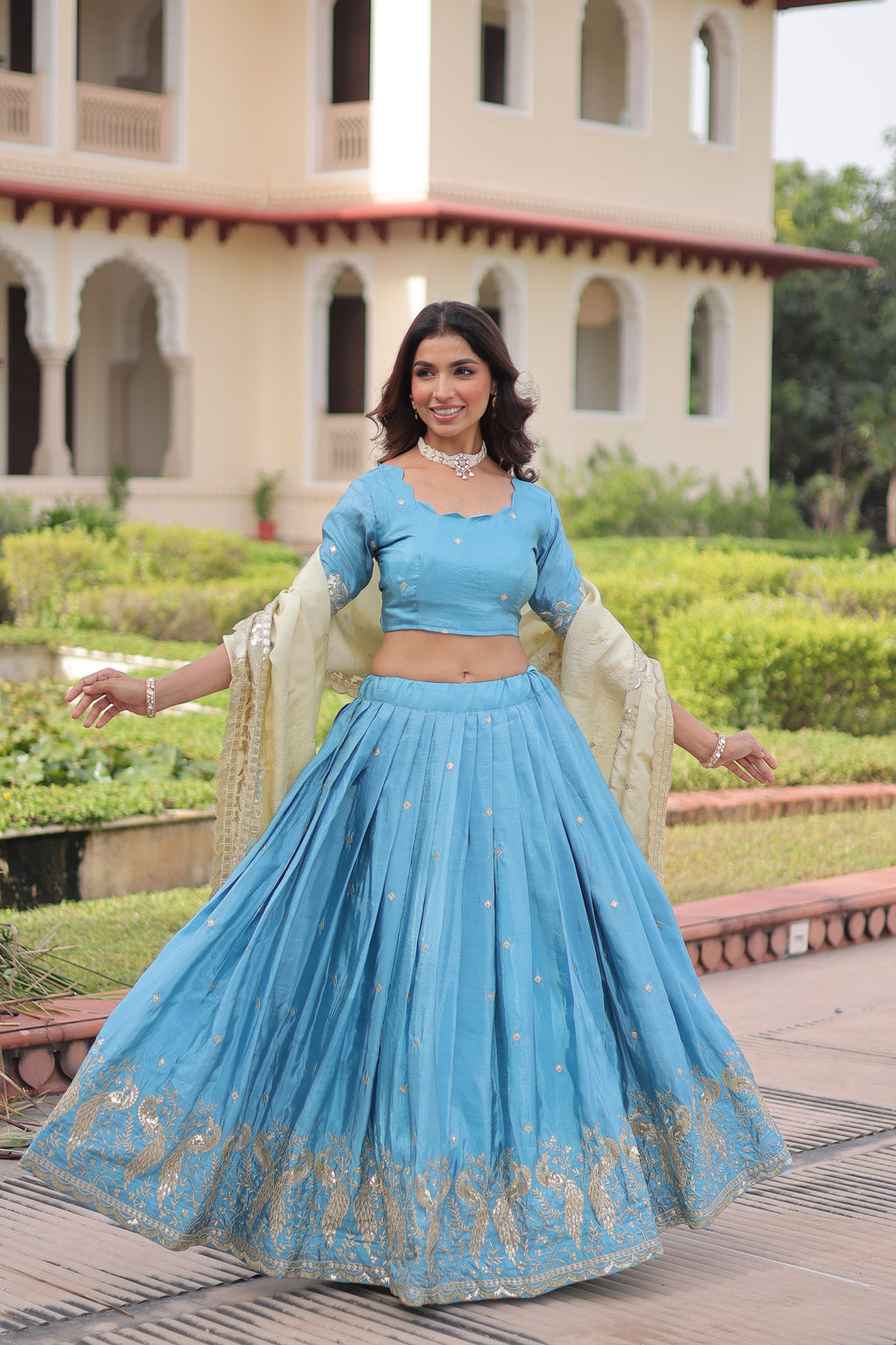Nirika sky blue gold crush lehenga choli with sequins zari embroidered work