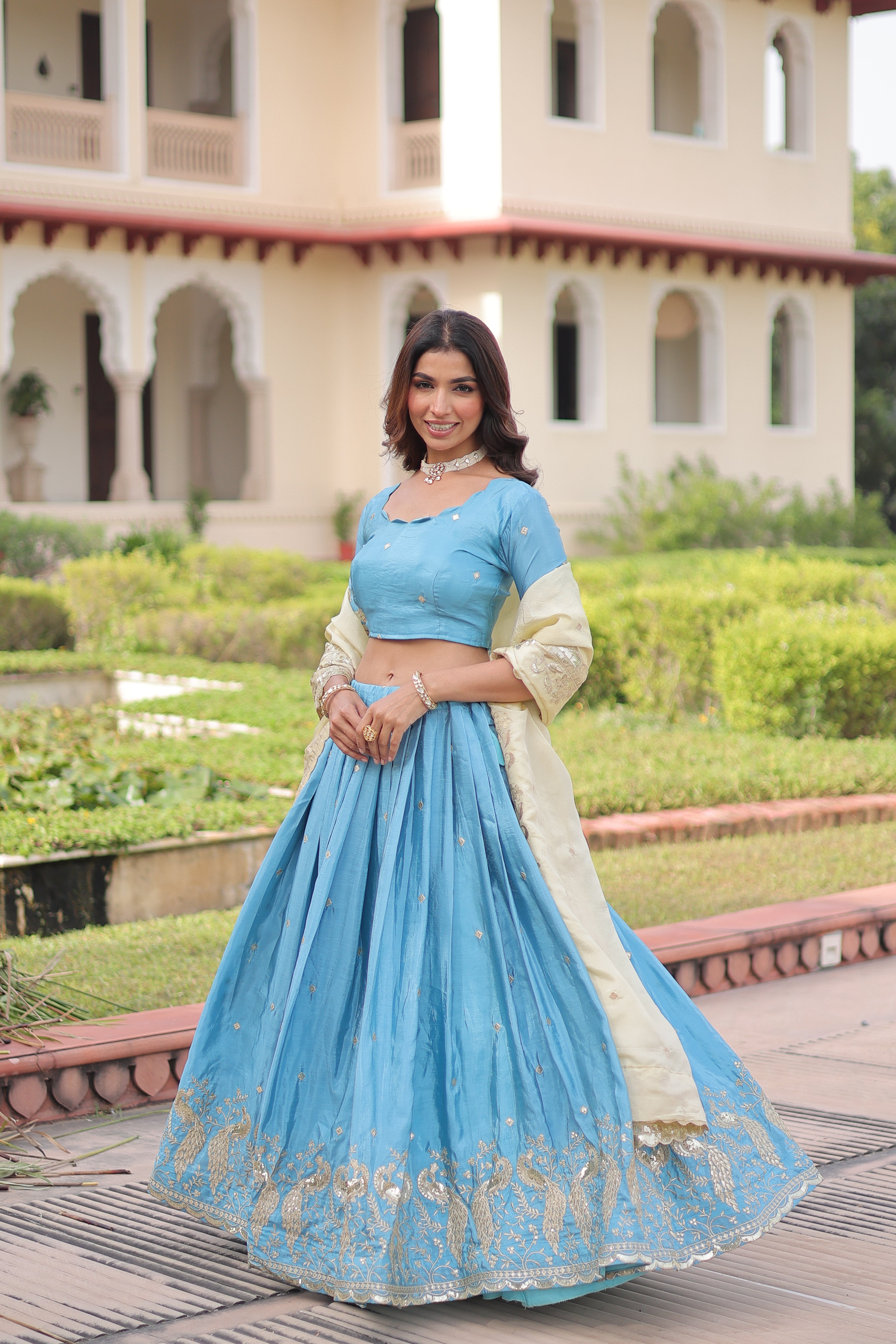 Nirika sky blue gold crush lehenga choli with sequins zari embroidered work