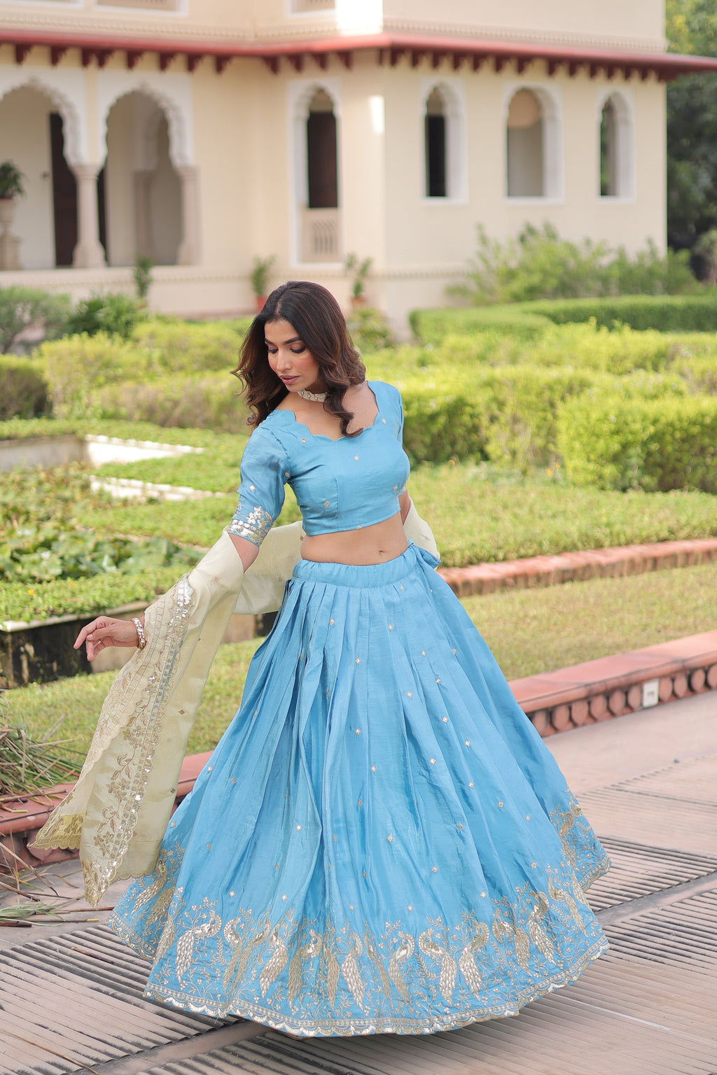 Nirika sky blue gold crush lehenga choli with sequins zari embroidered work