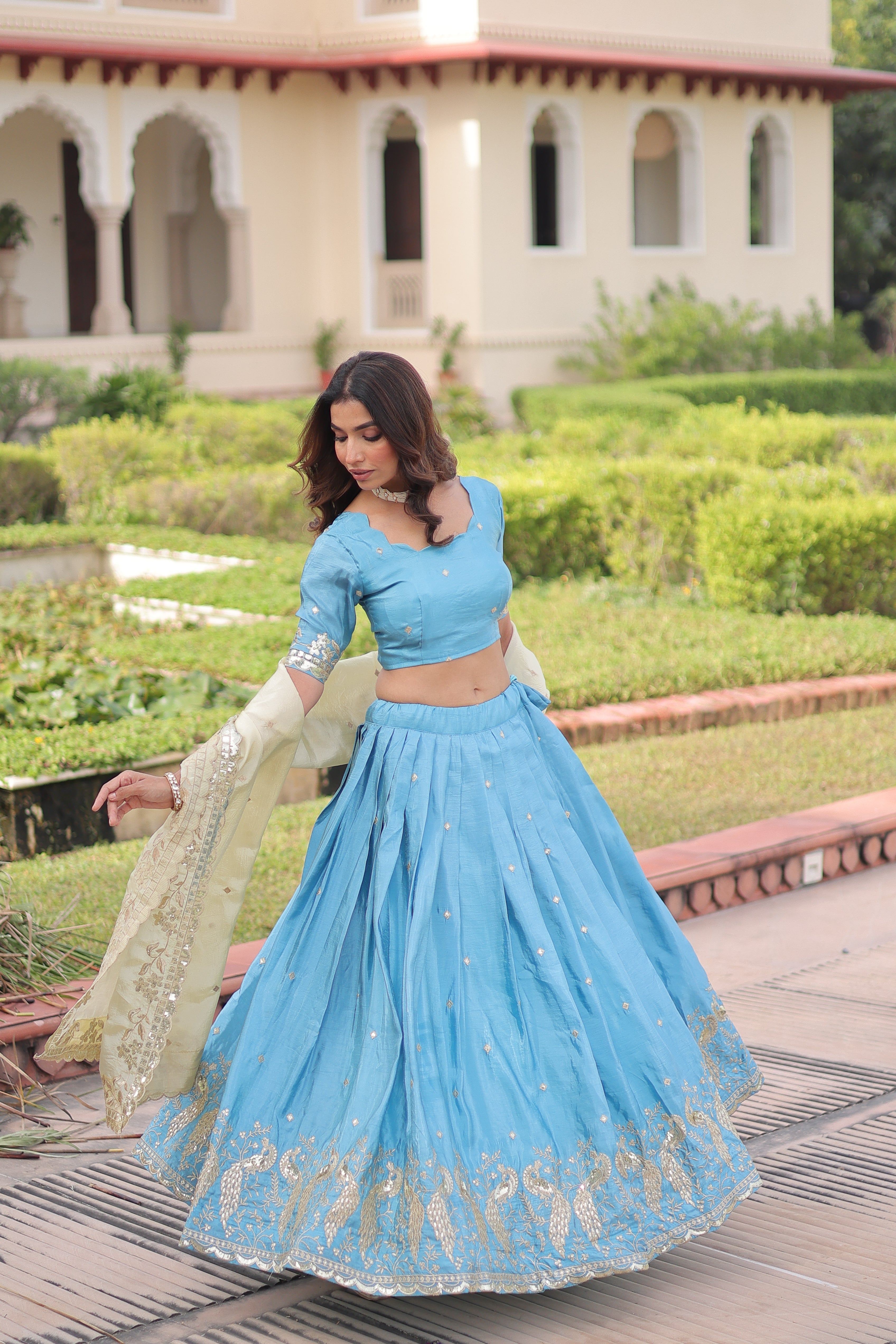 Nirika sky blue gold crush lehenga choli with sequins zari embroidered work