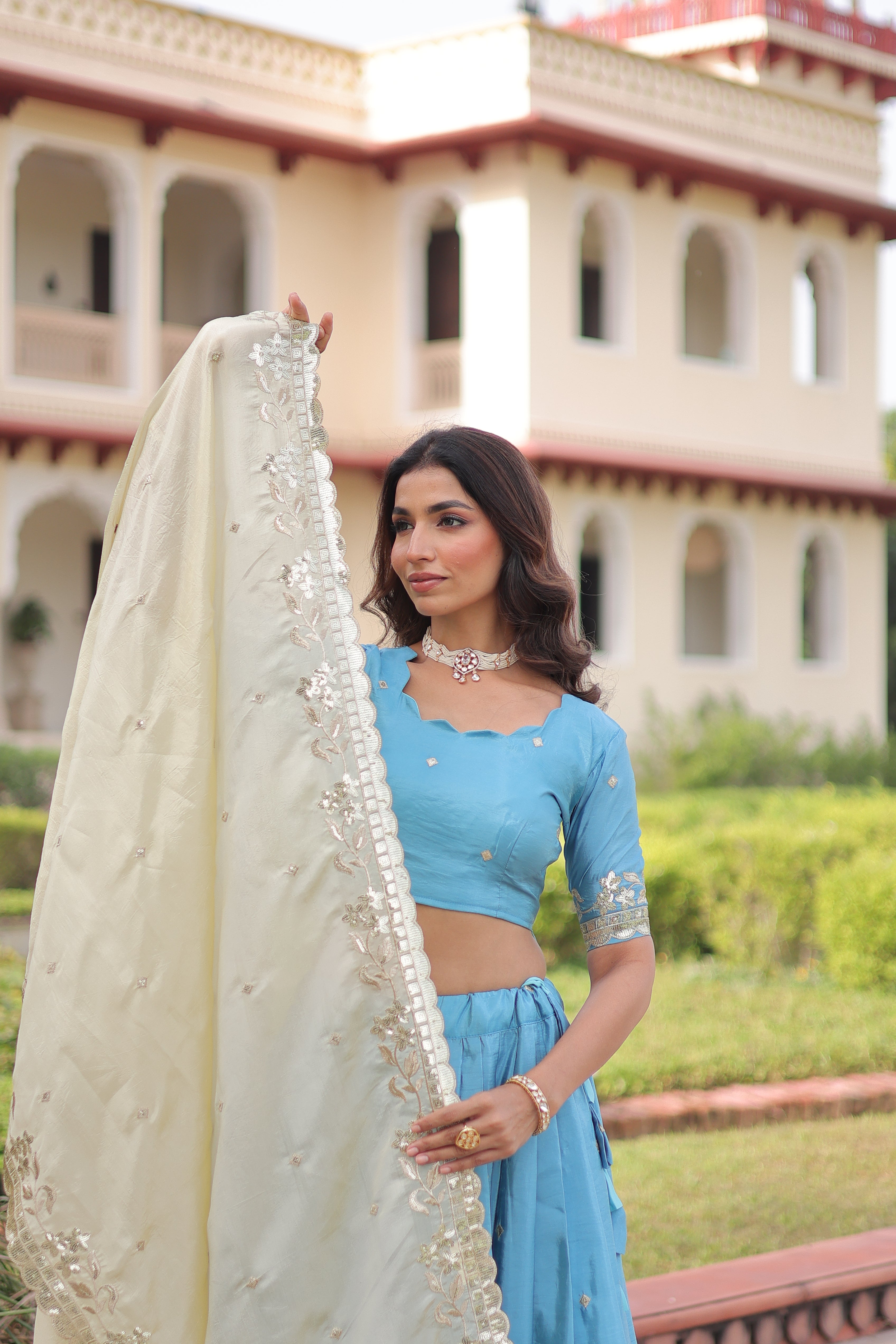 Nirika sky blue gold crush lehenga choli with sequins zari embroidered work