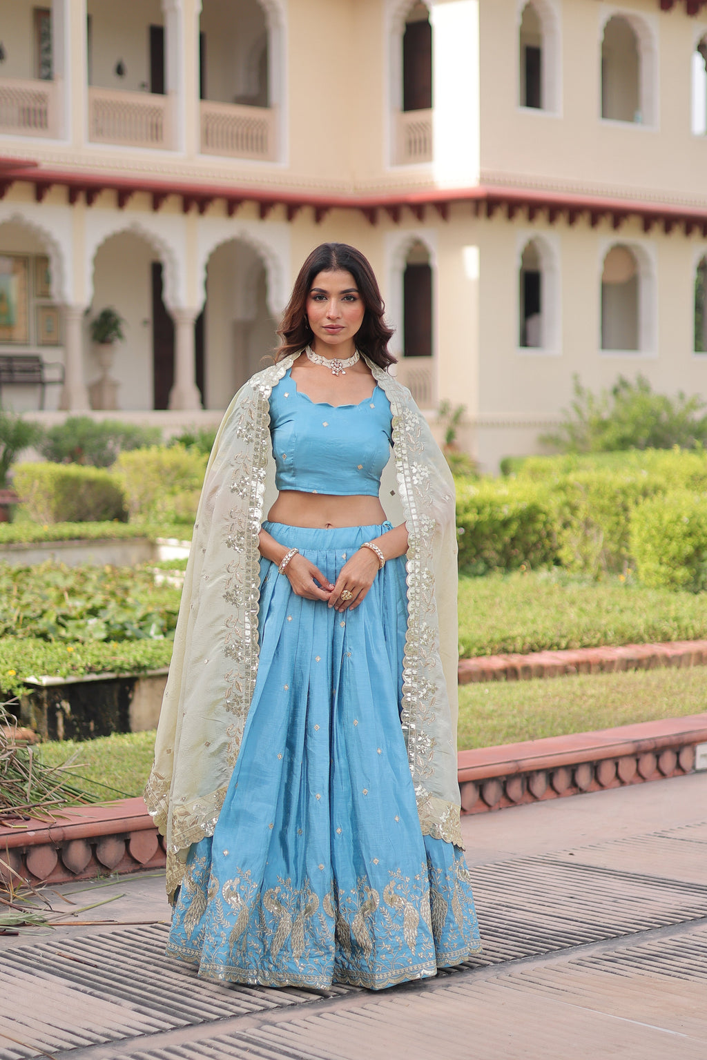 Nirika sky blue gold crush lehenga choli with sequins zari embroidered work