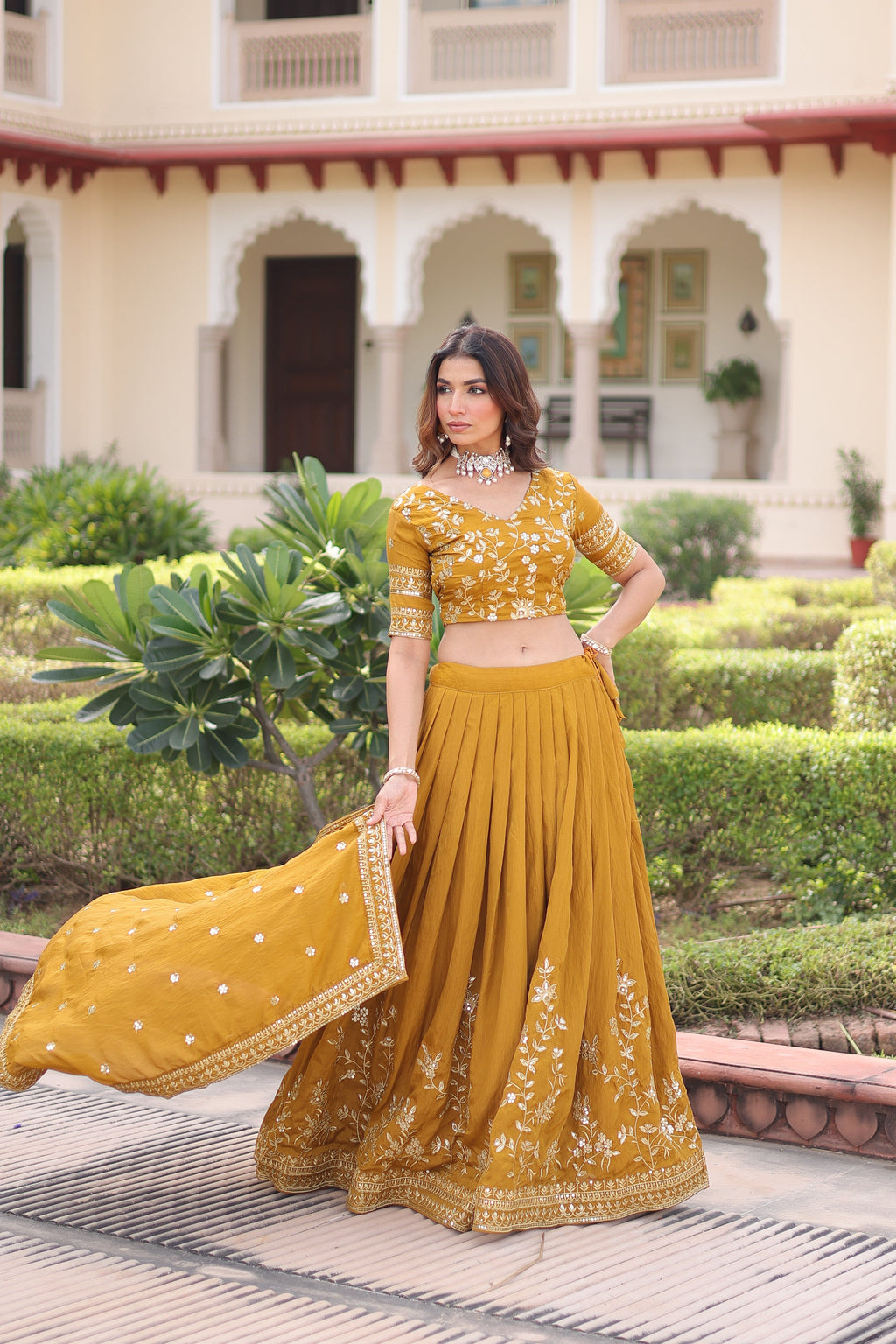 Ruvika mustard yellow Vichitra silk lehenga choli with sequins zari embroidered work