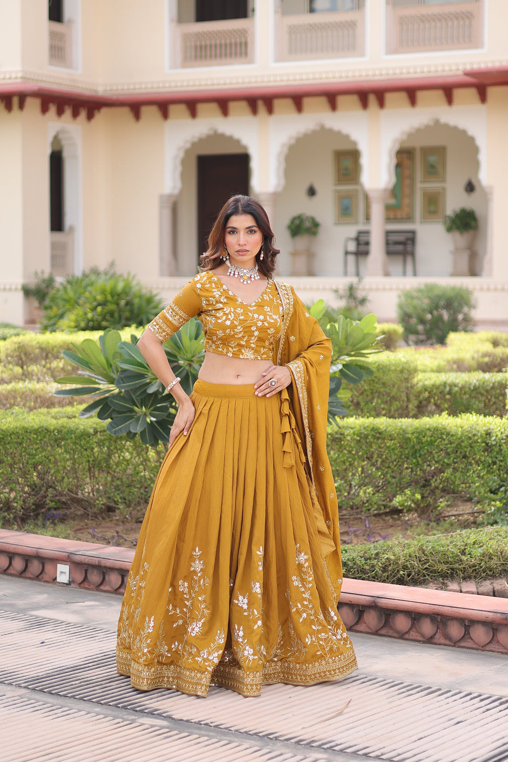 Ruvika mustard yellow Vichitra silk lehenga choli with sequins zari embroidered work