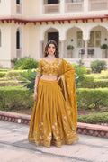Ruvika mustard yellow Vichitra silk lehenga choli with sequins zari embroidered work