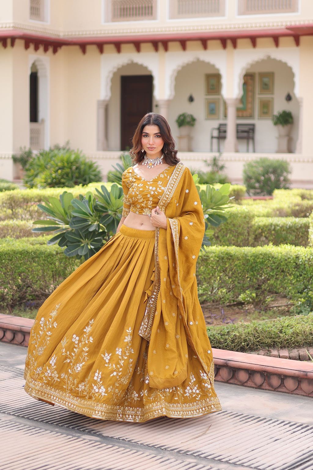 Ruvika mustard yellow Vichitra silk lehenga choli with sequins zari embroidered work