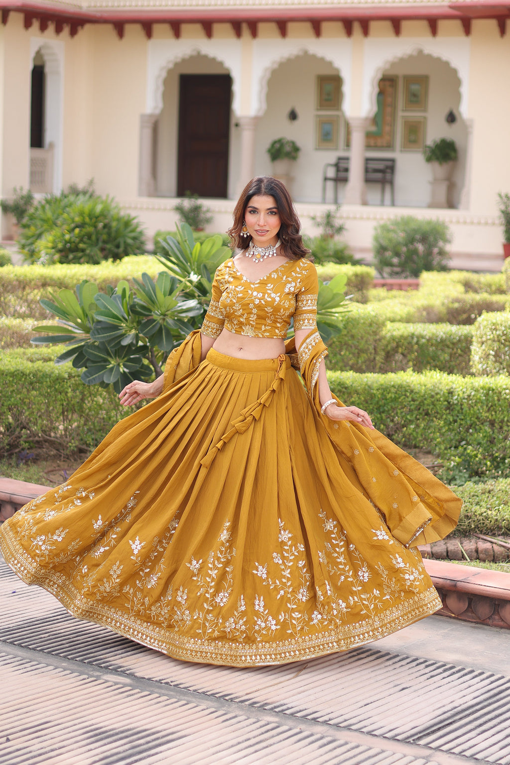 Ruvika mustard yellow Vichitra silk lehenga choli with sequins zari embroidered work