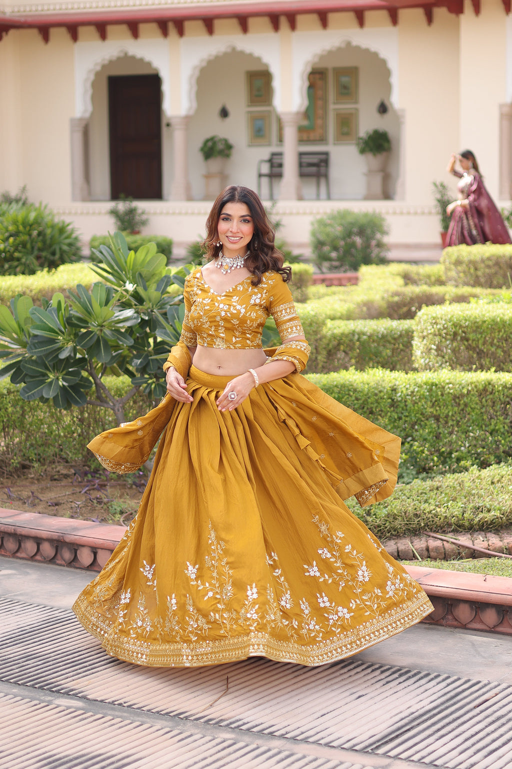 Ruvika mustard yellow Vichitra silk lehenga choli with sequins zari embroidered work
