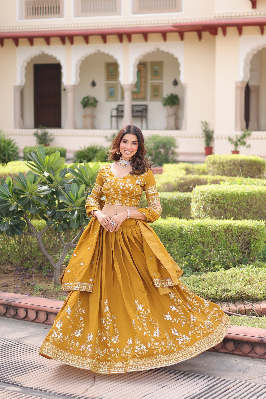 Ruvika mustard yellow Vichitra silk lehenga choli with sequins zari embroidered work
