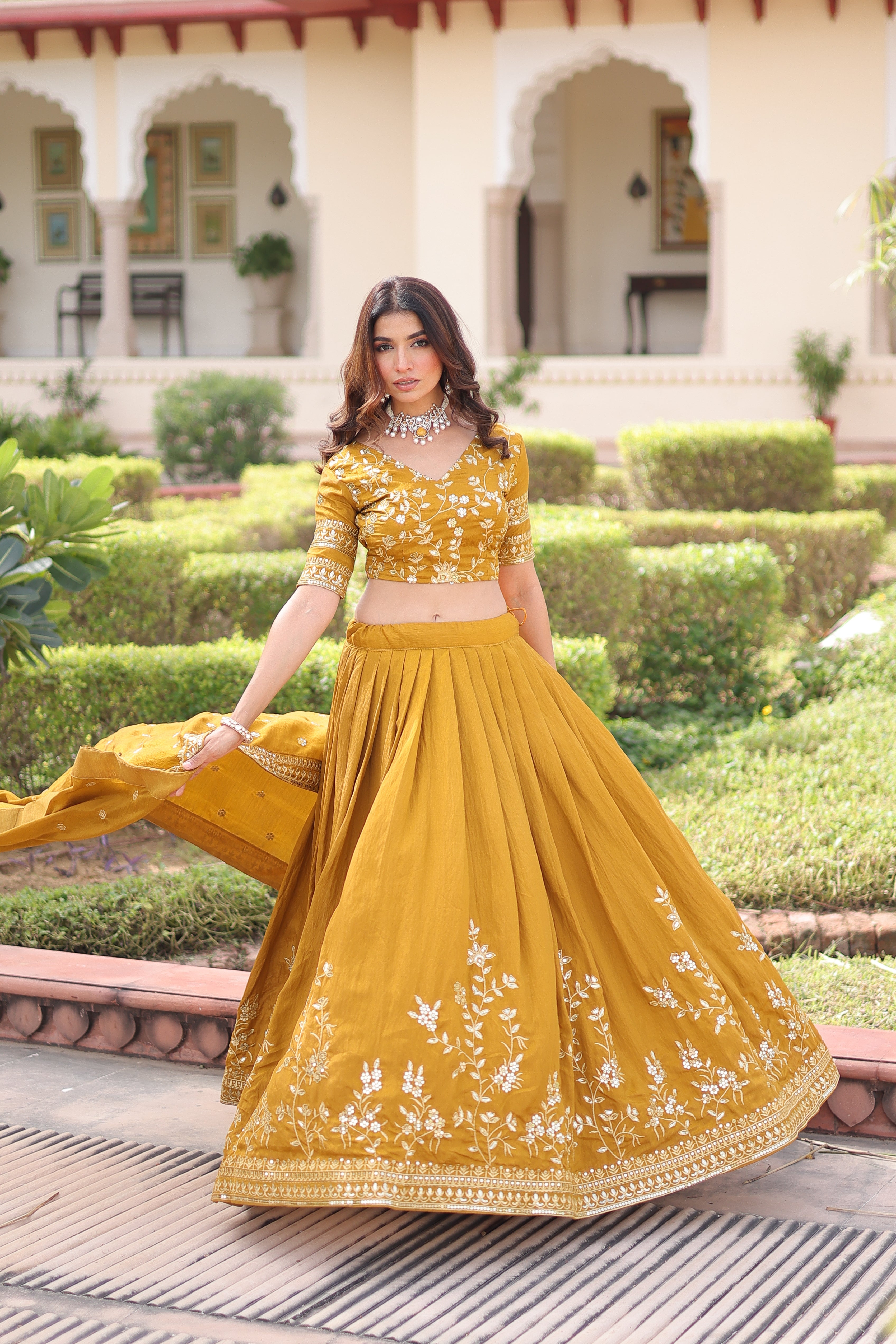 Ruvika mustard yellow Vichitra silk lehenga choli with sequins zari embroidered work