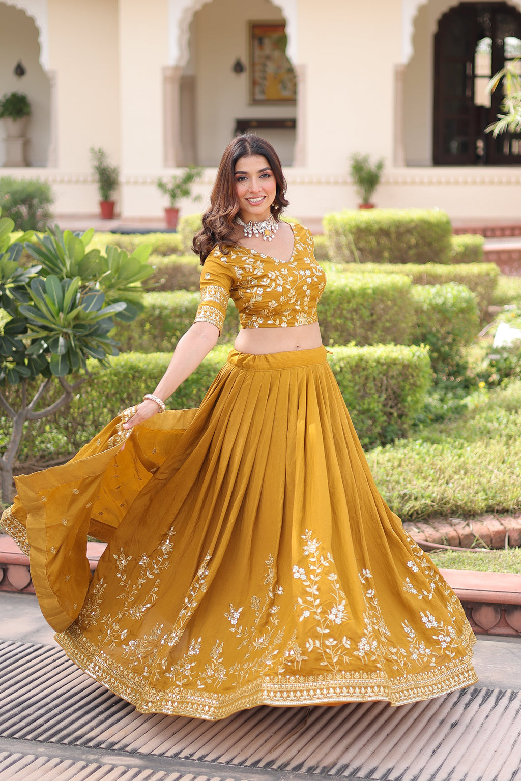 Ruvika mustard yellow Vichitra silk lehenga choli with sequins zari embroidered work