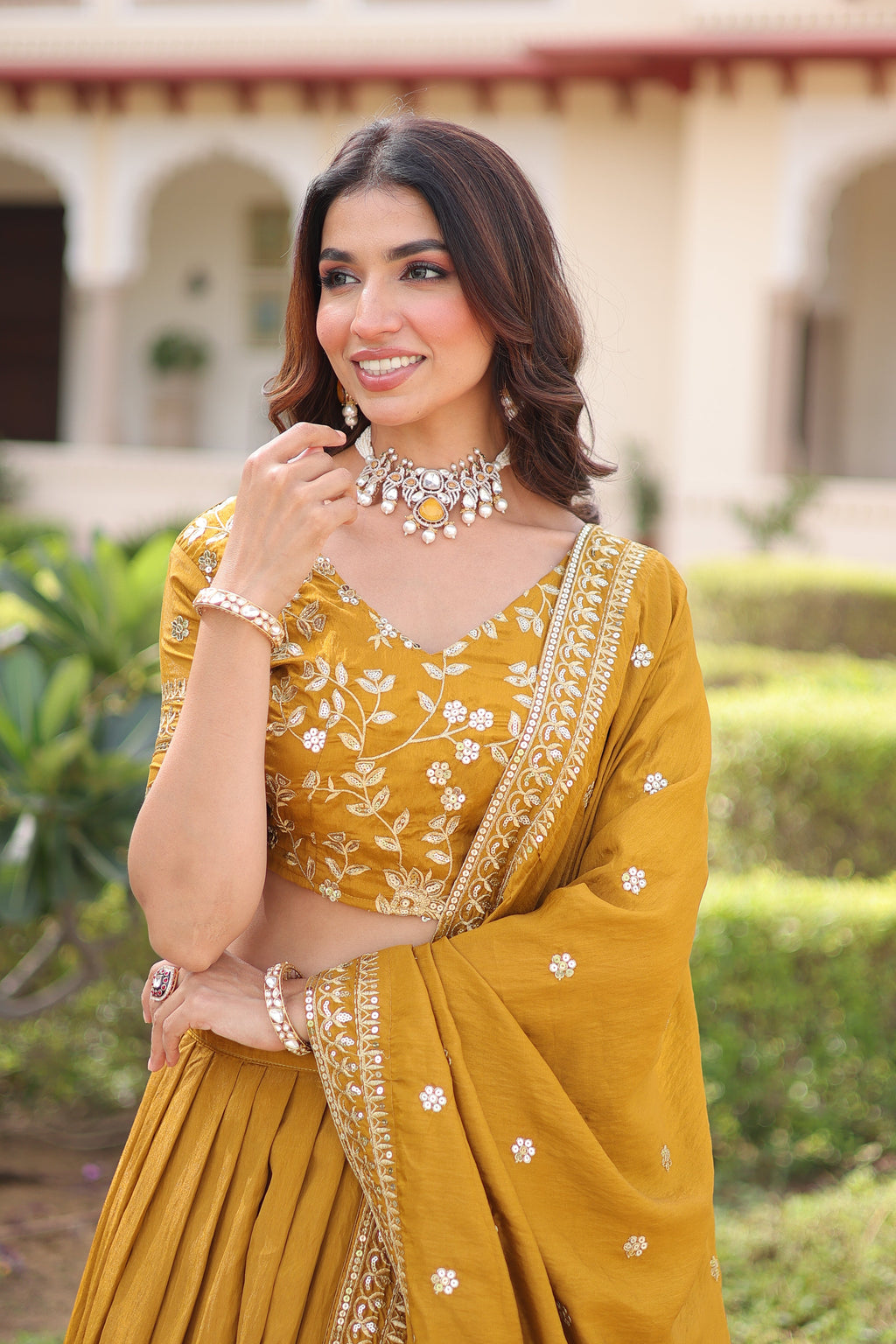 Ruvika mustard yellow Vichitra silk lehenga choli with sequins zari embroidered work