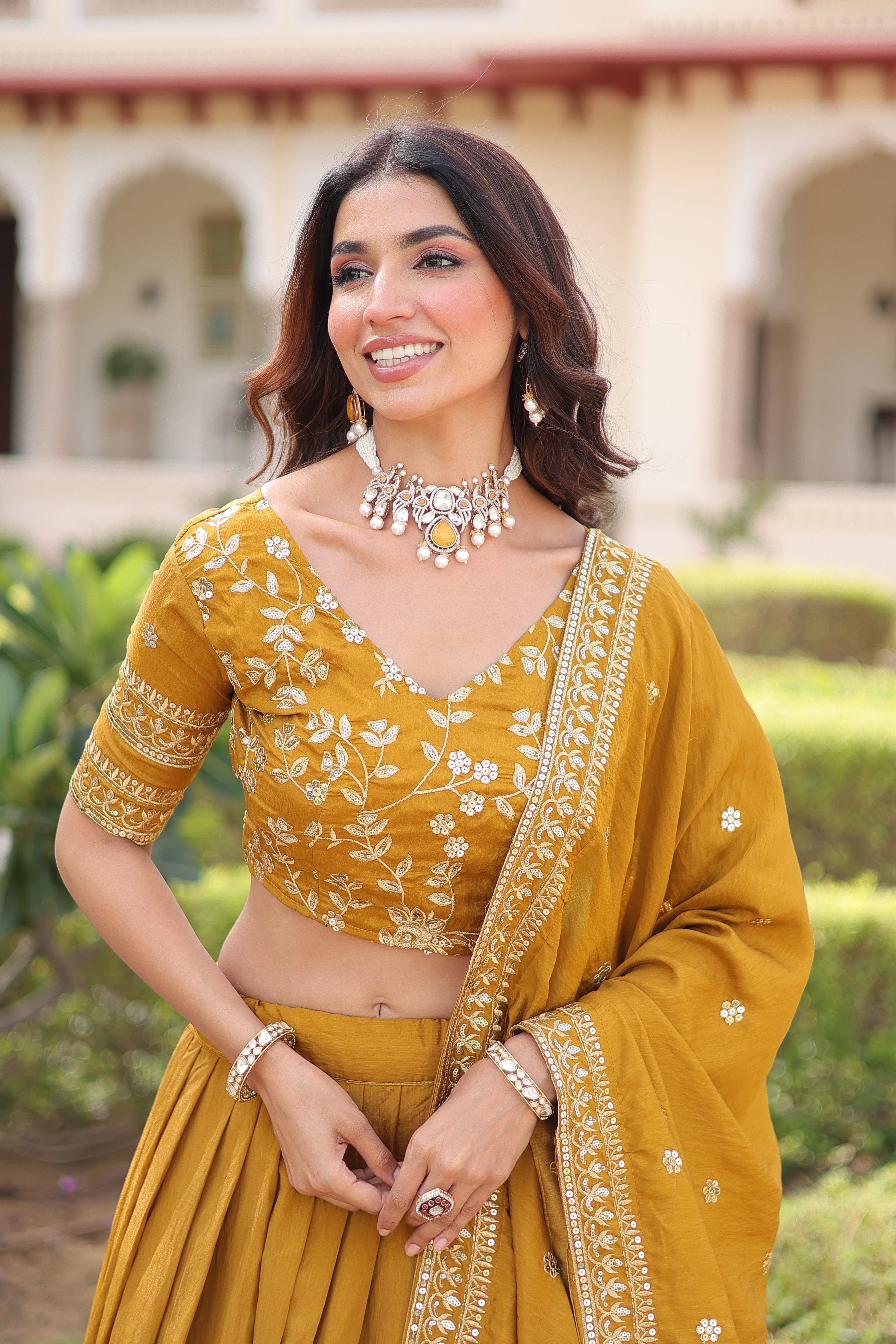 Ruvika mustard yellow Vichitra silk lehenga choli with sequins zari embroidered work