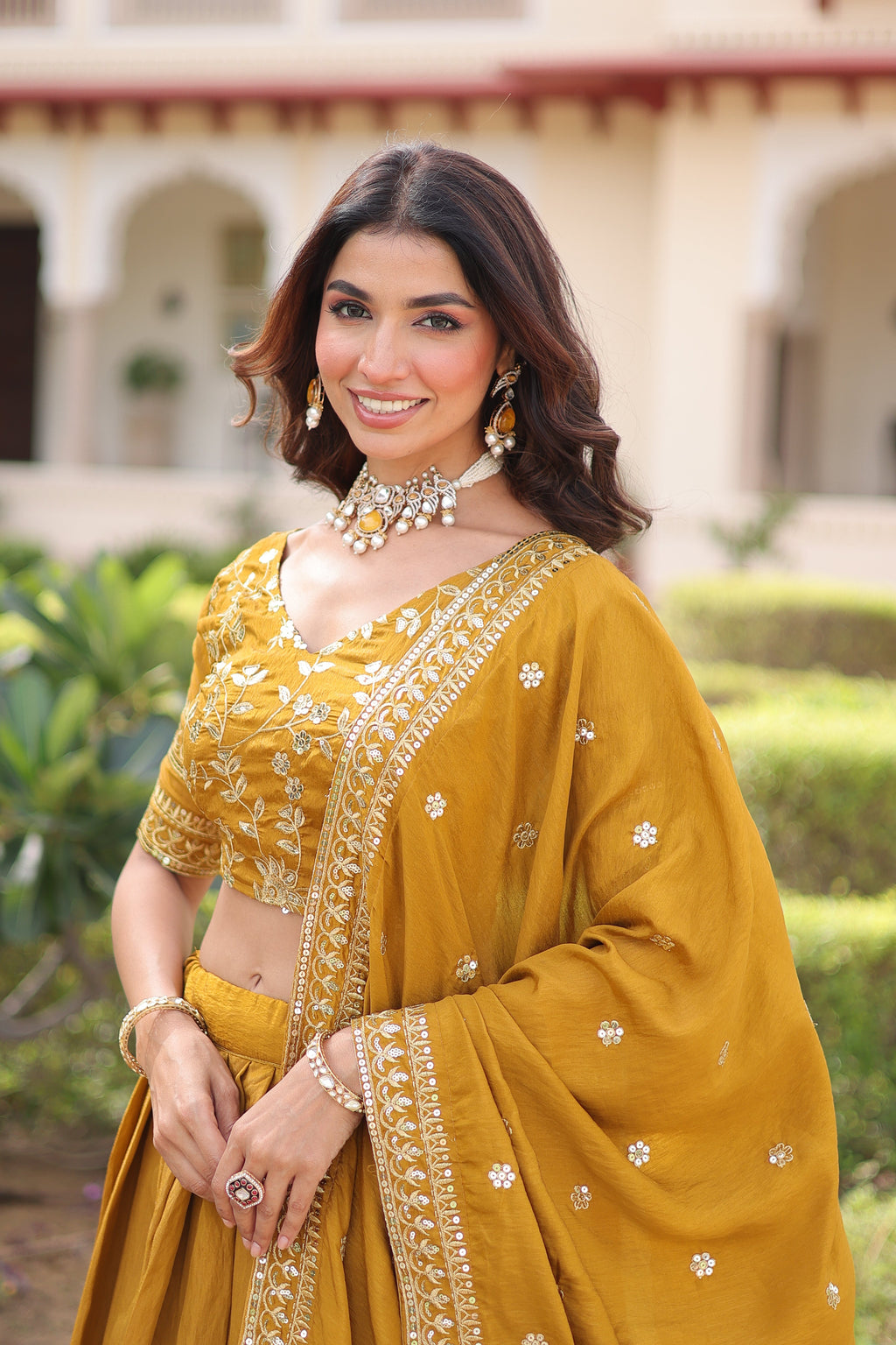 Ruvika mustard yellow Vichitra silk lehenga choli with sequins zari embroidered work