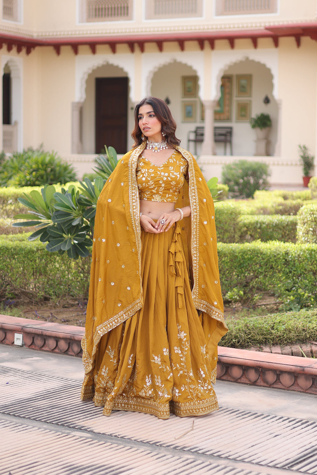 Ruvika mustard yellow Vichitra silk lehenga choli with sequins zari embroidered work