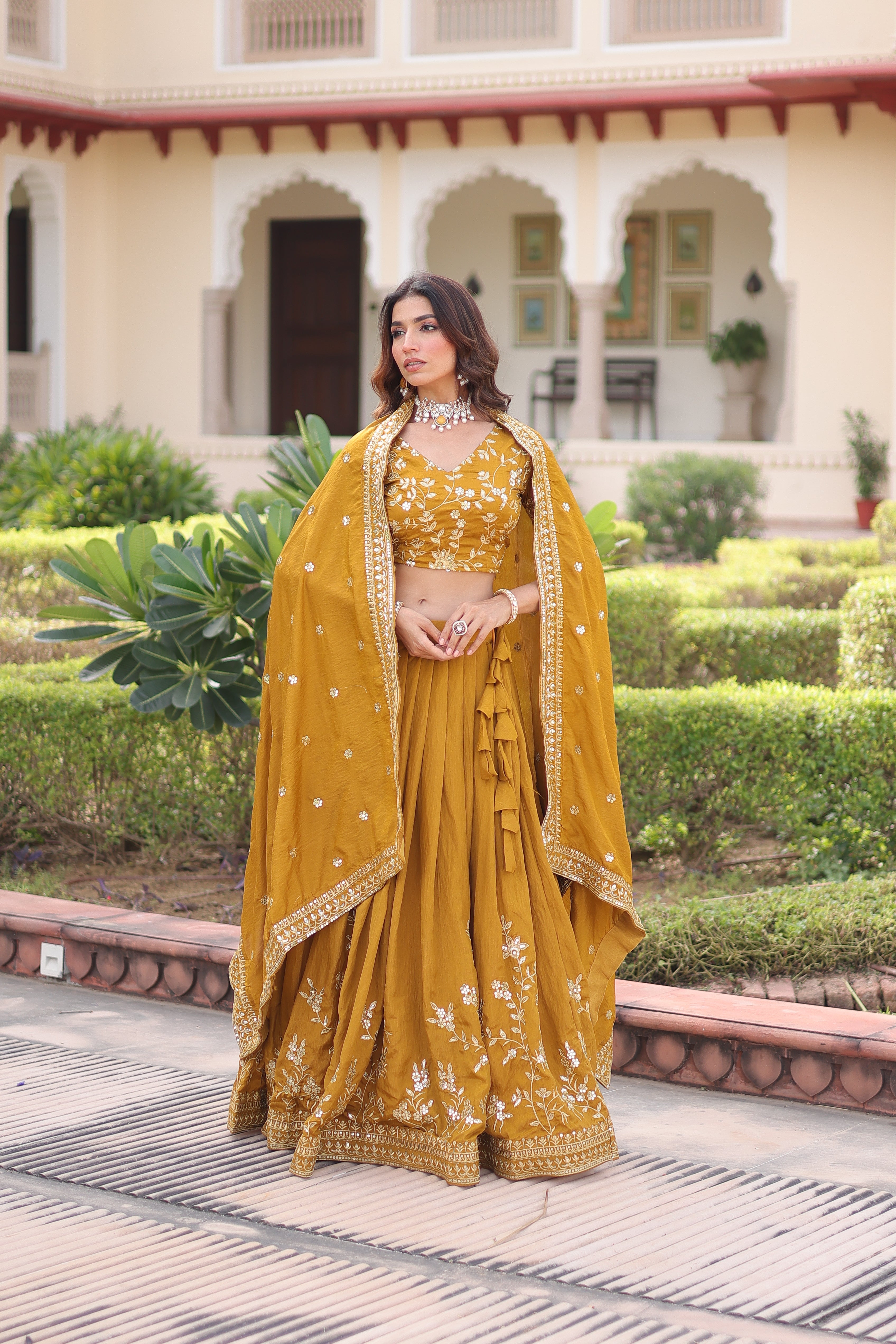 Ruvika mustard yellow Vichitra silk lehenga choli with sequins zari embroidered work