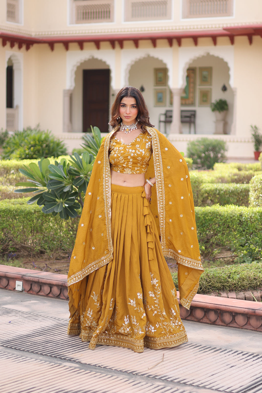 Ruvika mustard yellow Vichitra silk lehenga choli with sequins zari embroidered work