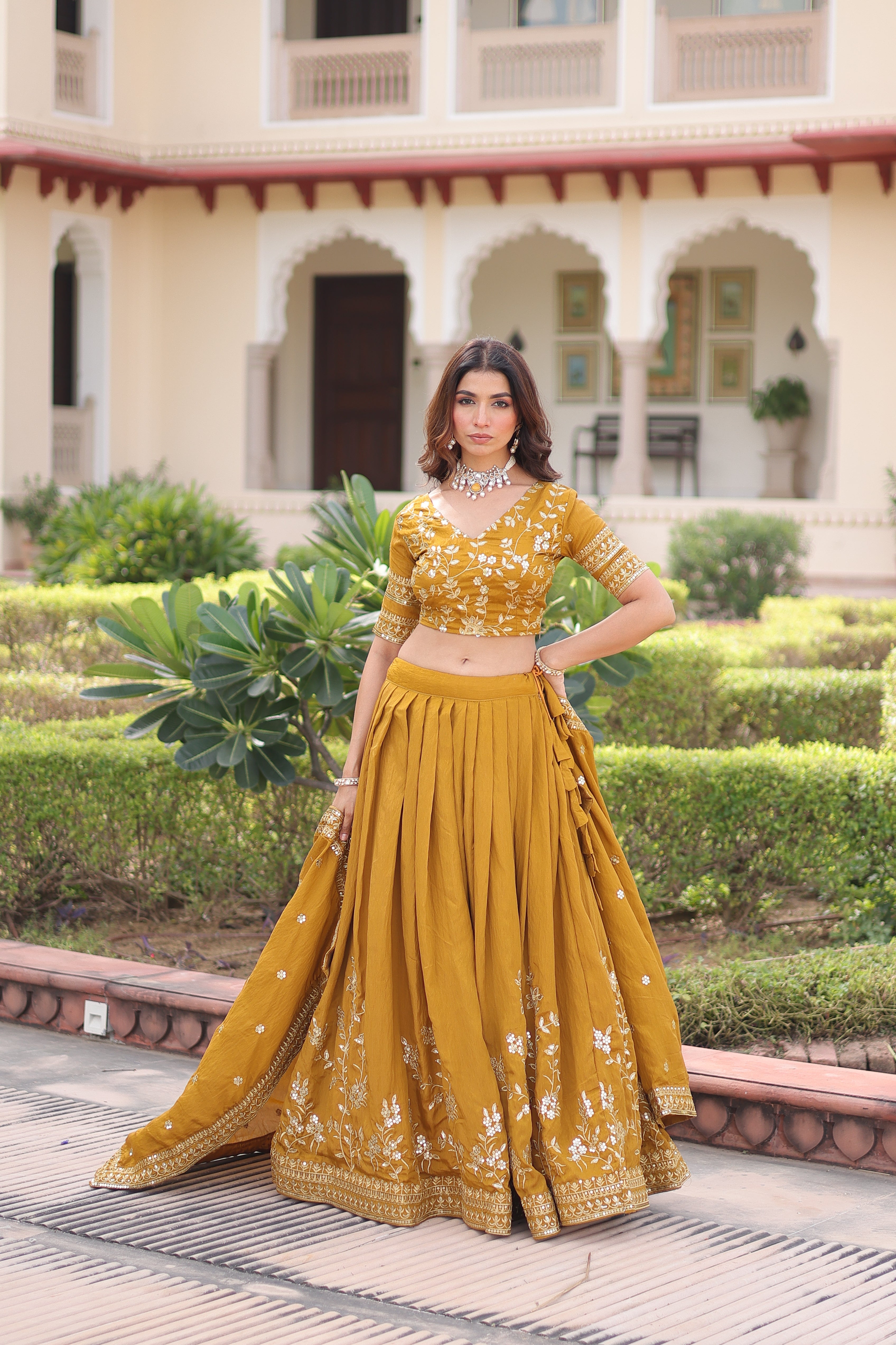 Ruvika mustard yellow Vichitra silk lehenga choli with sequins zari embroidered work